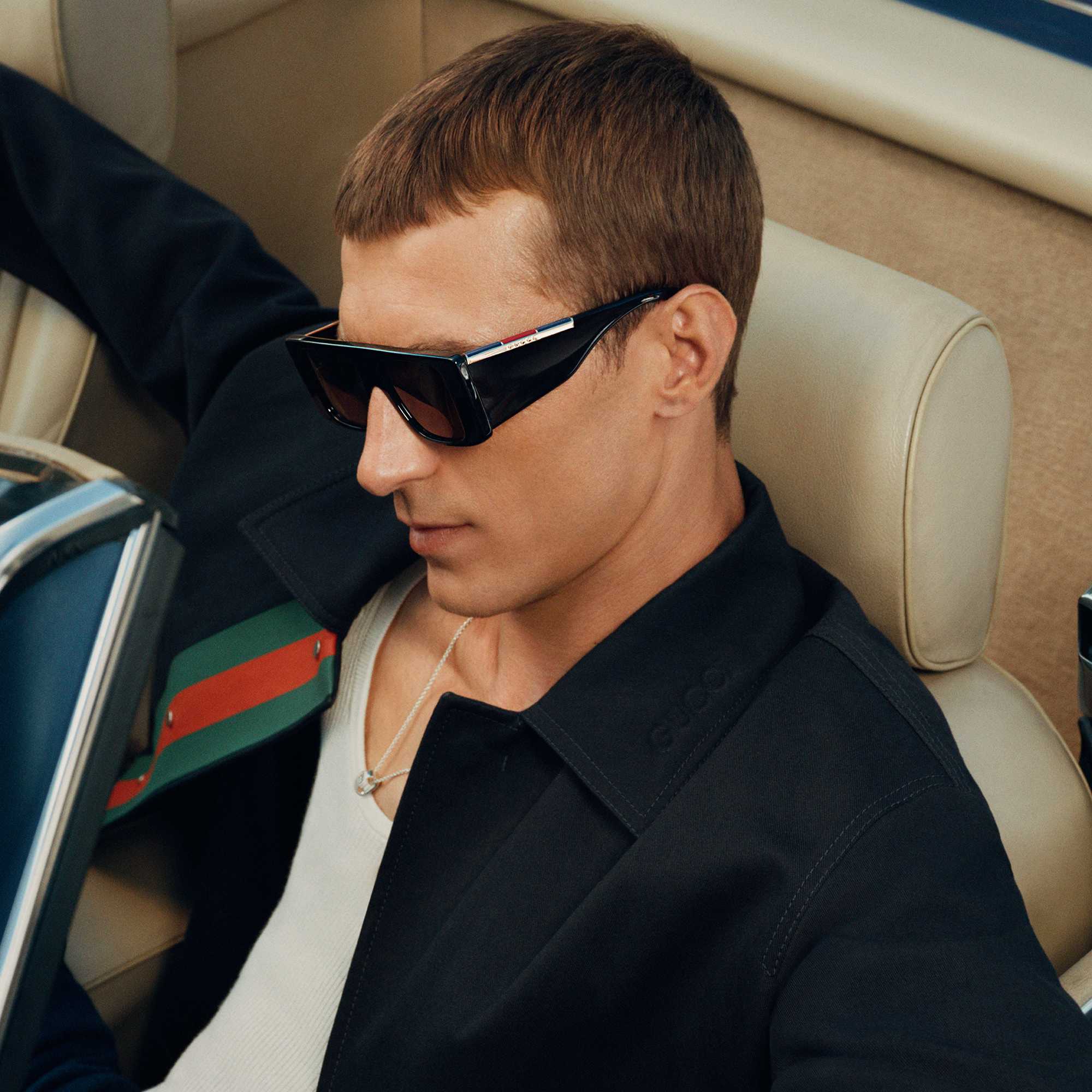 Man wearing Gucci Sunglasses 
