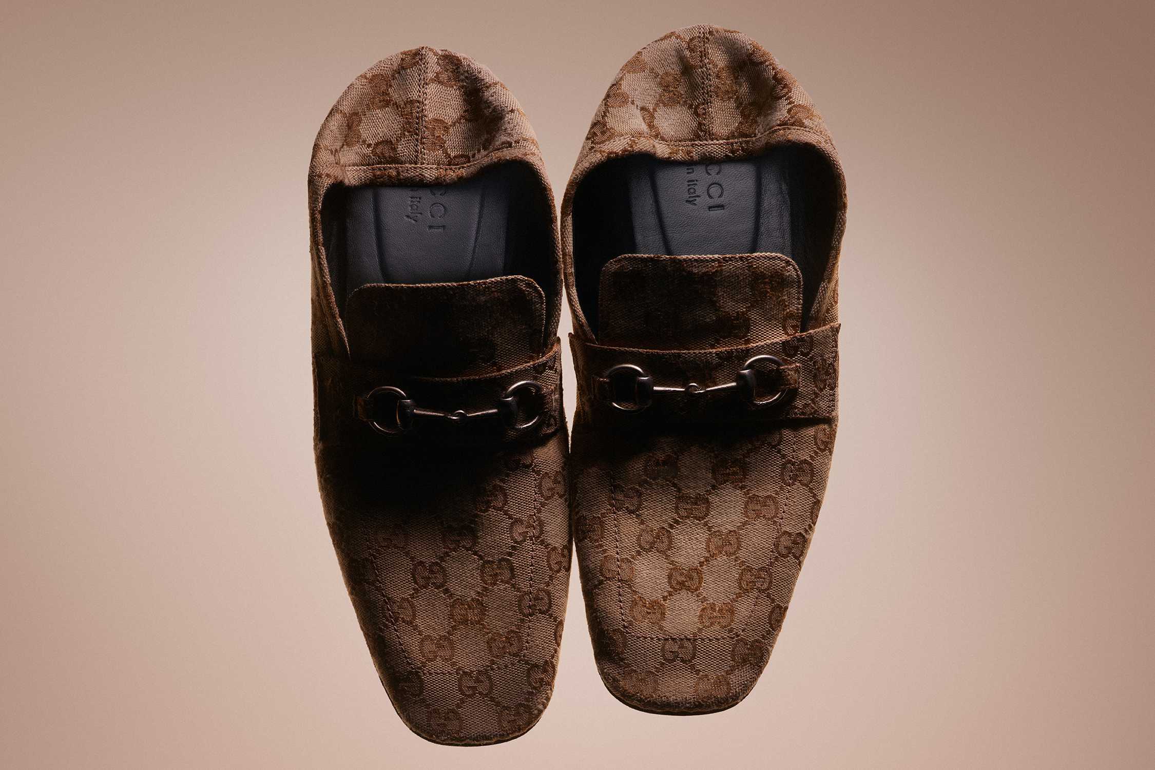 Brown Gucci monogram loafers