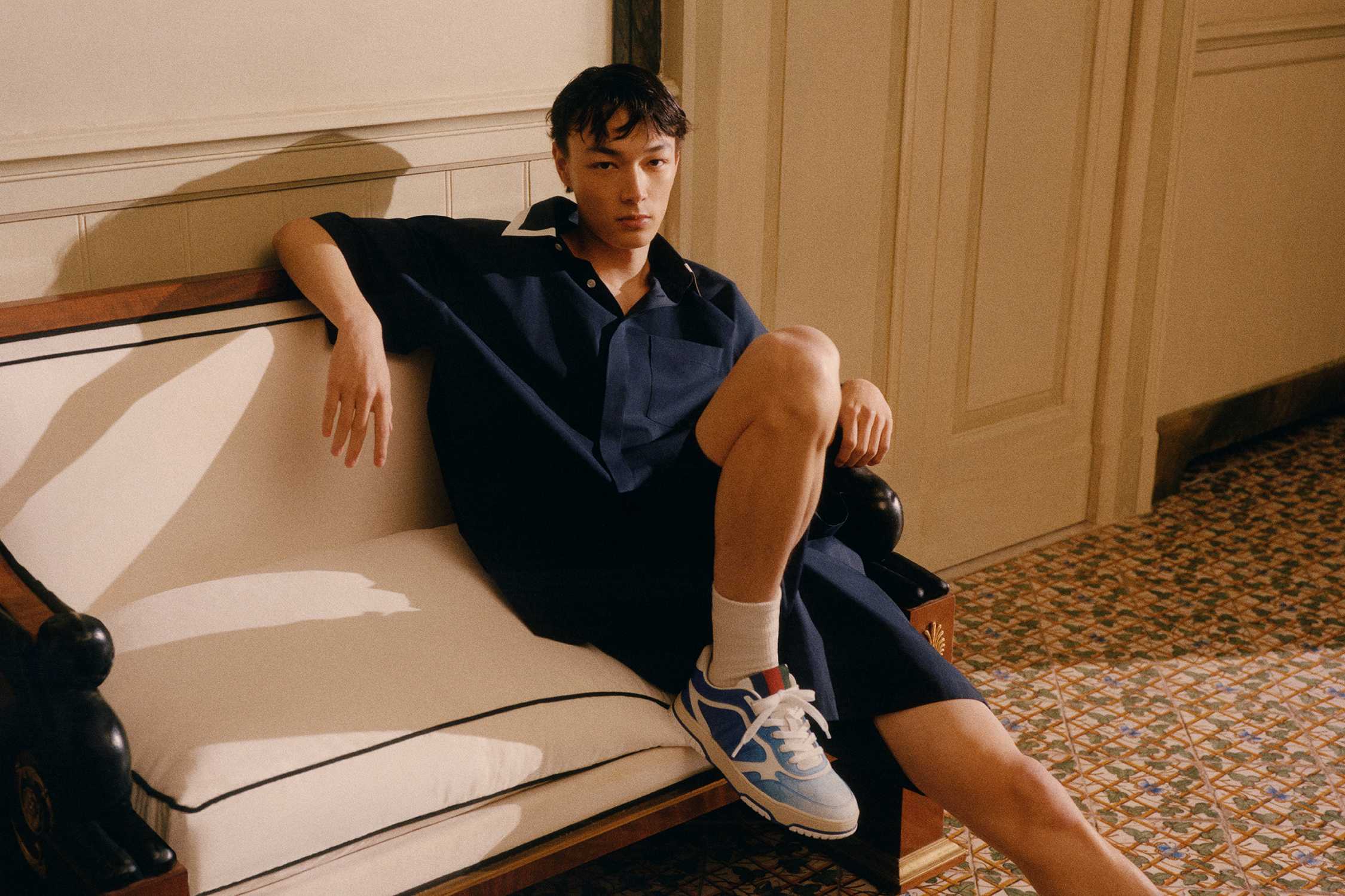 Navy Gucci outfit with sneakers