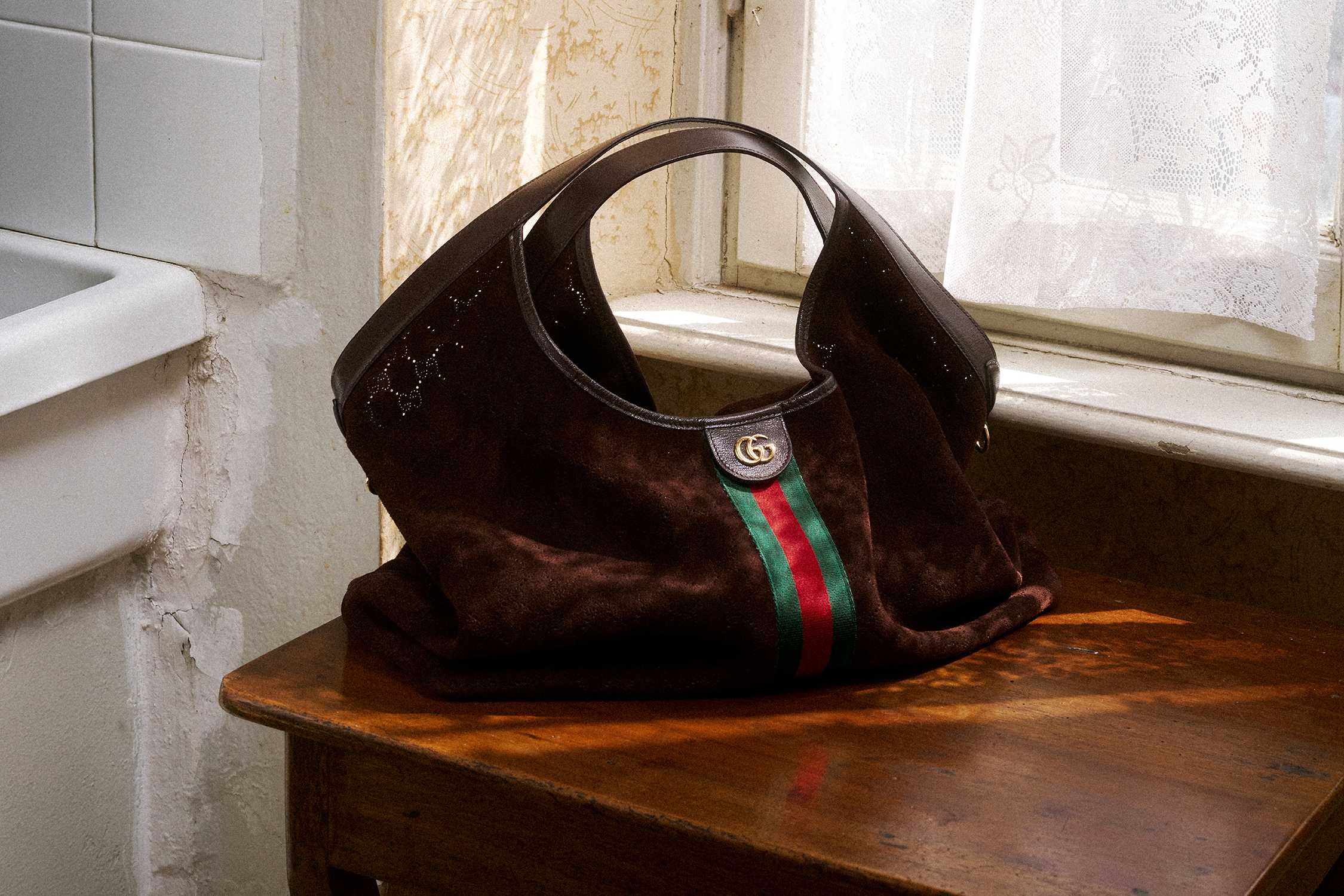 Gucci Giglio in brown GG perforated suede
