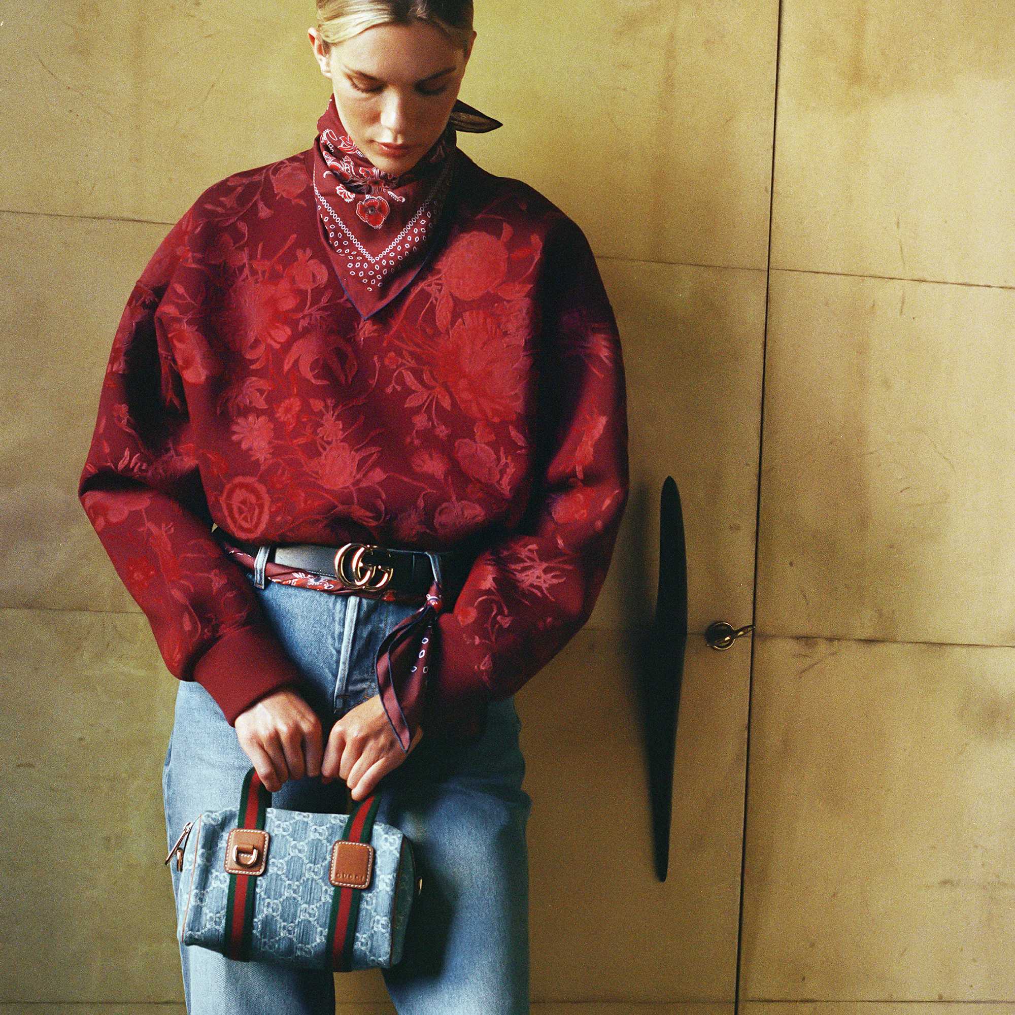 Red Gucci belt blue handbag