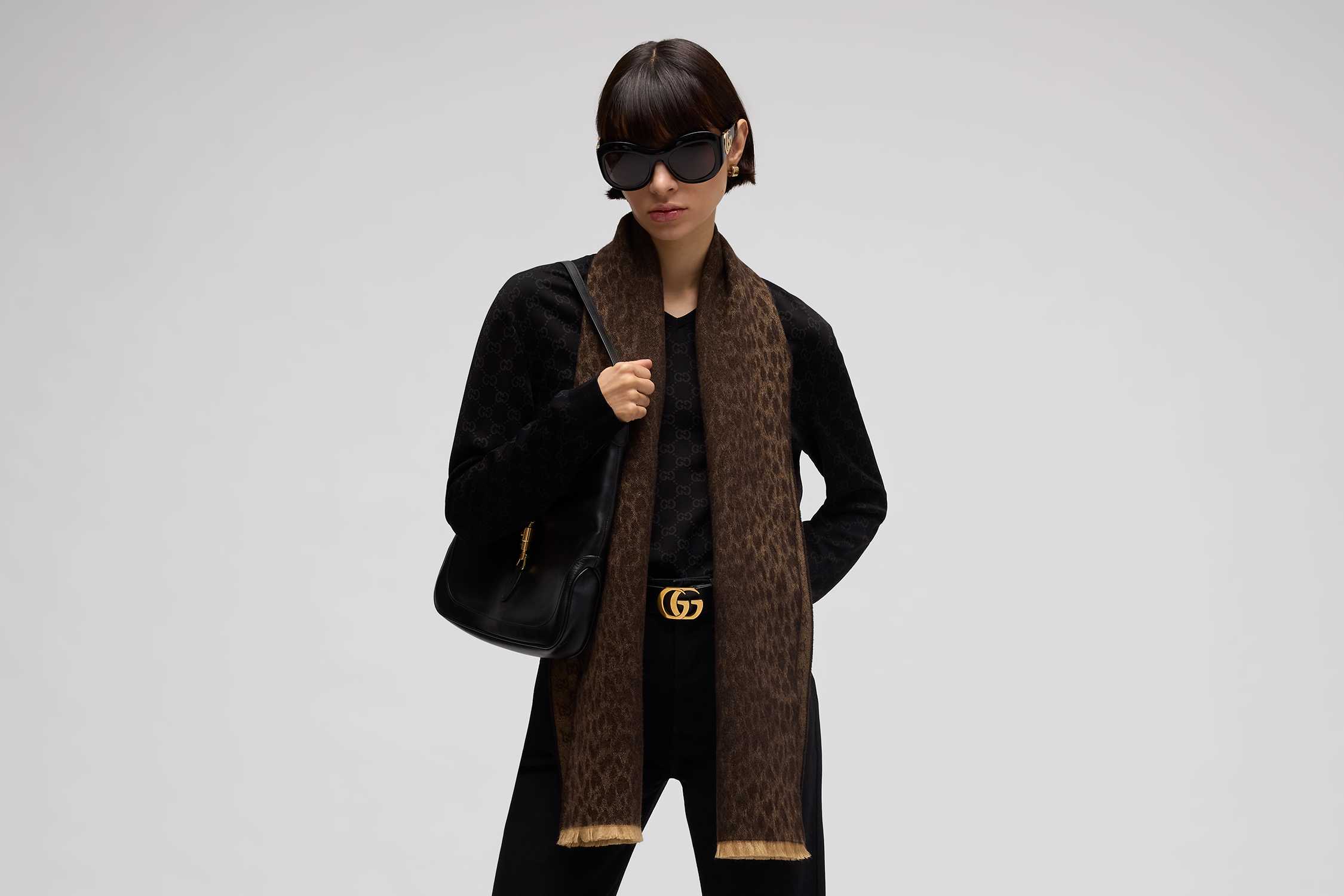 Black bag, brown scarf, belt.