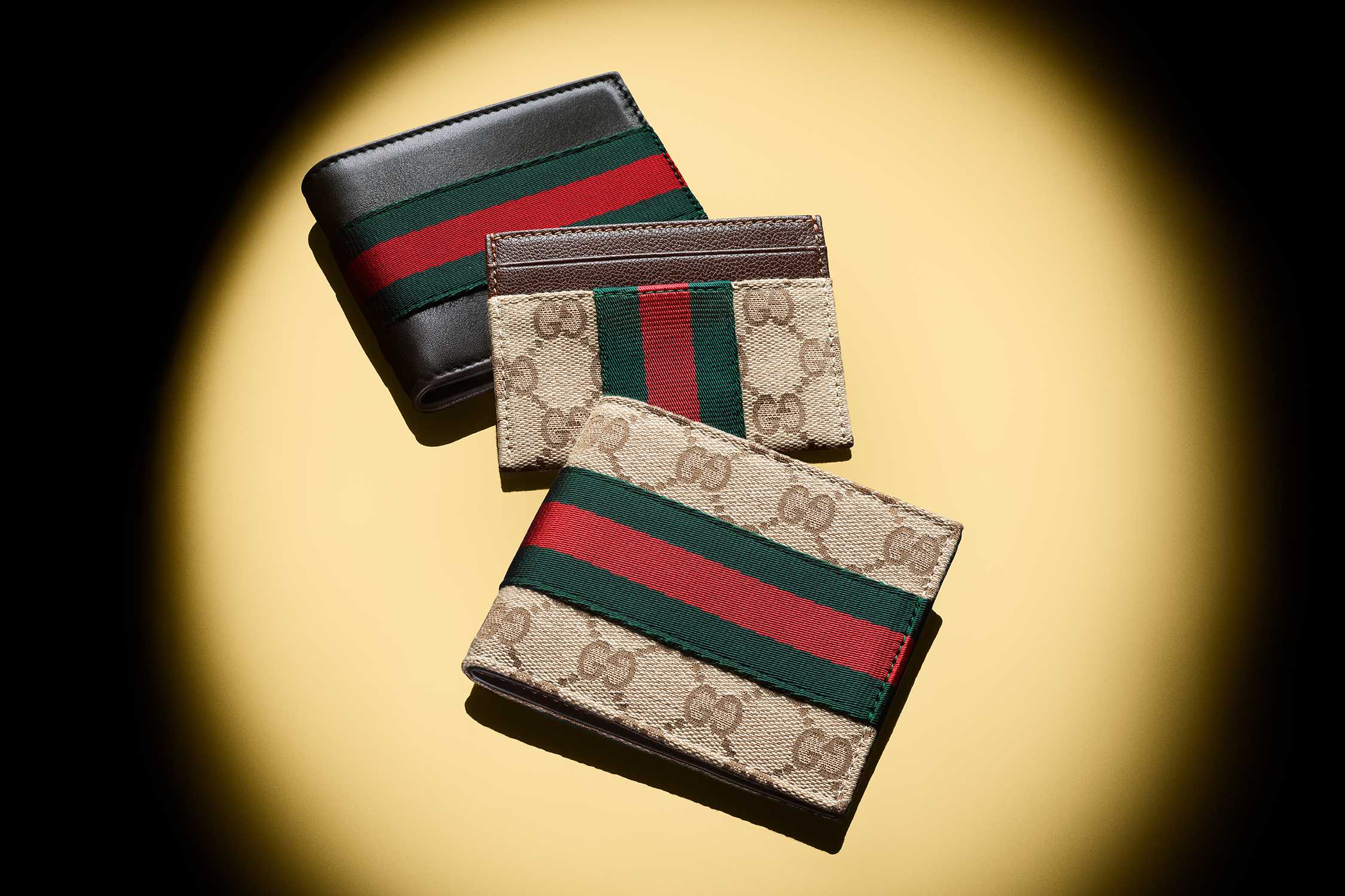 Gucci wallets with signature stripes
