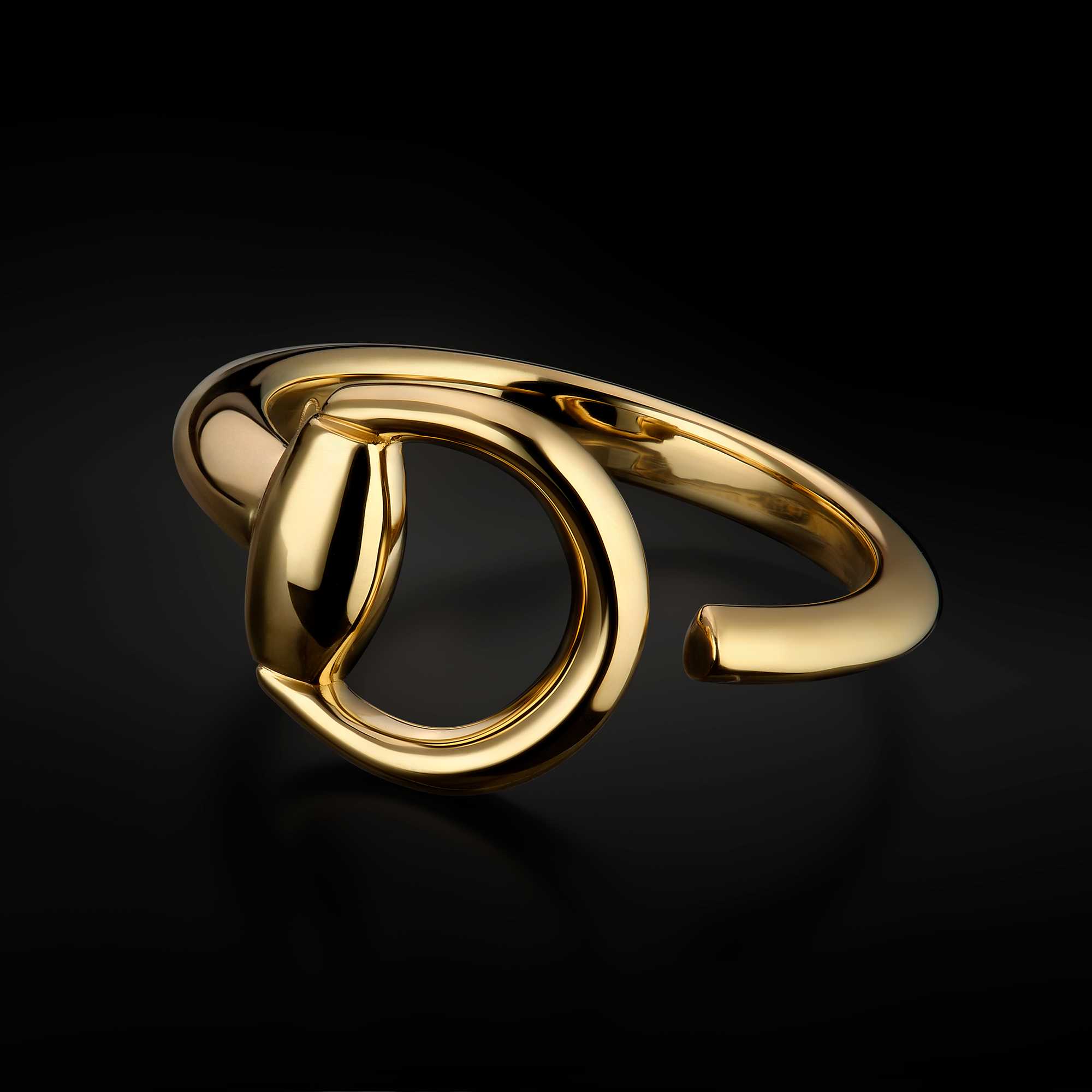 Gold Gucci spiral horsebit bracelet