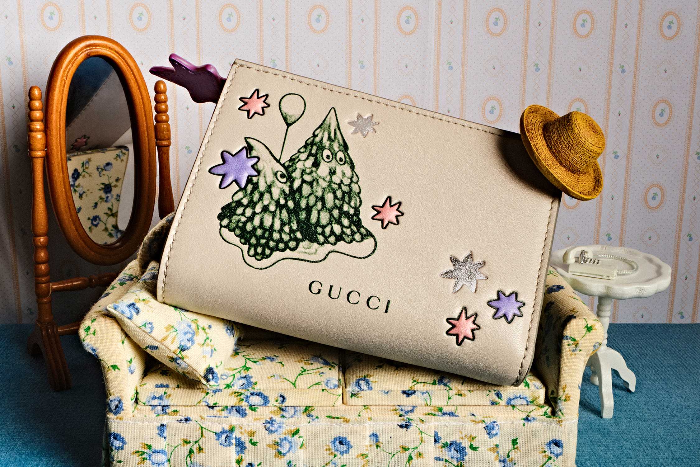 Cream Gucci wallet with trees