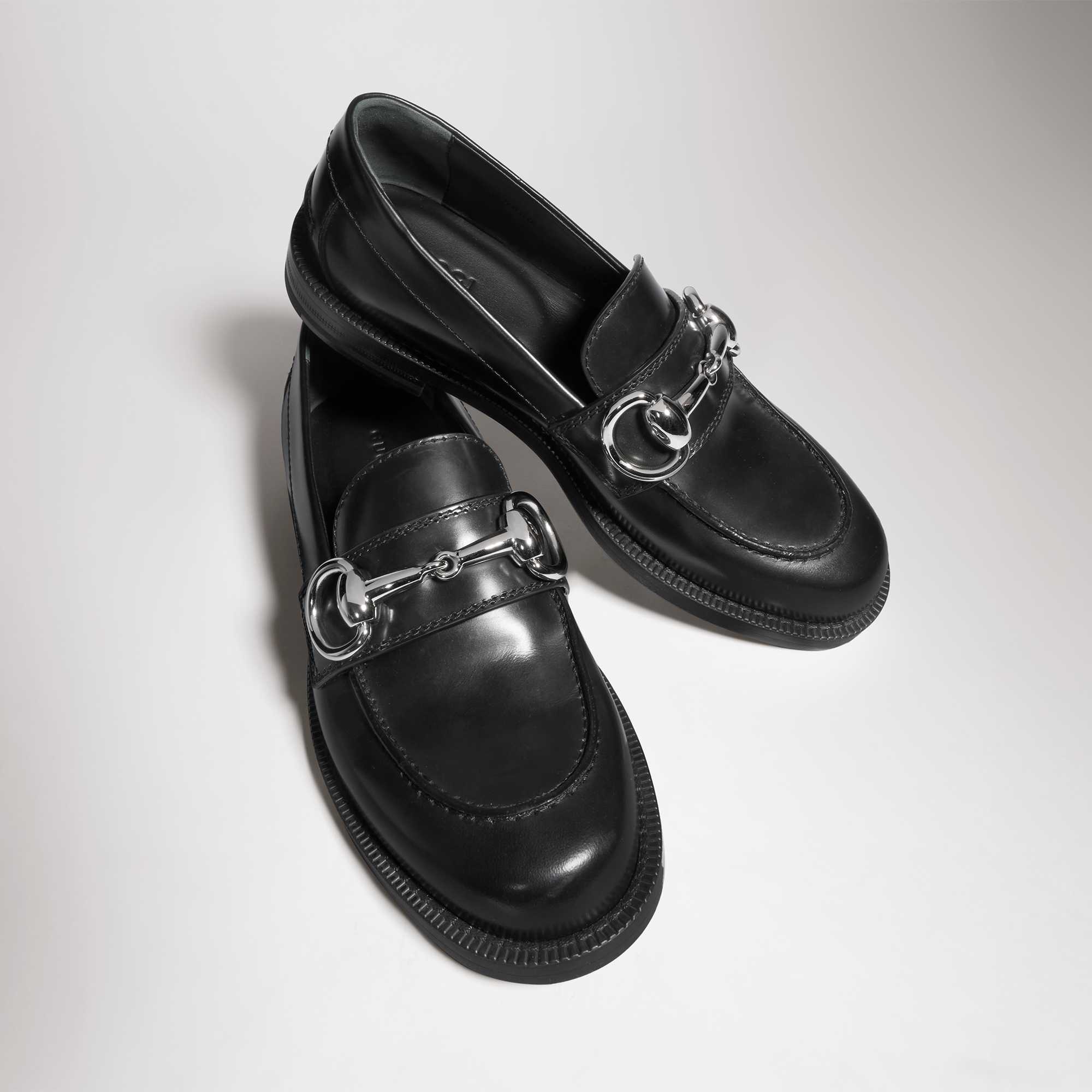 Gucci white loafers black bag