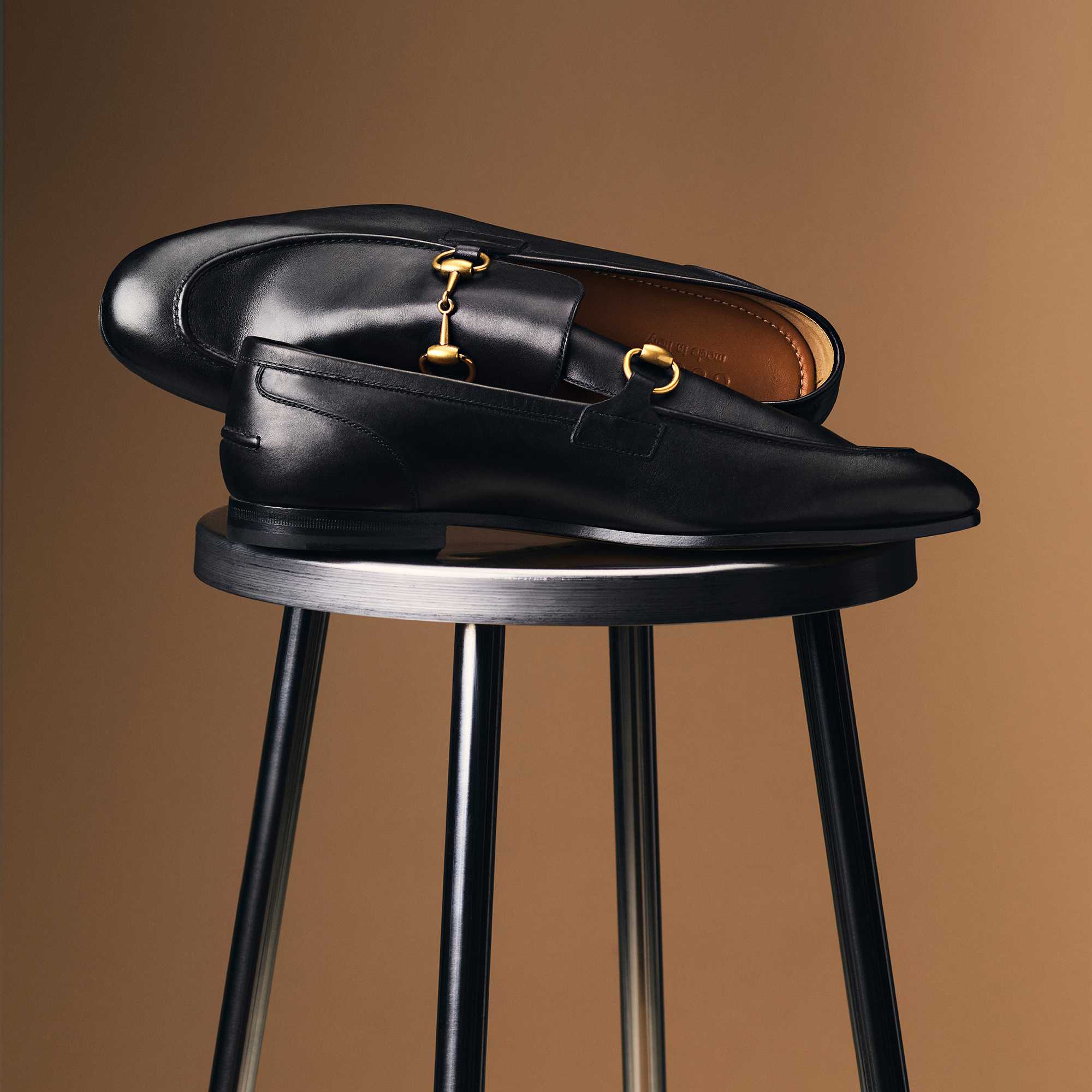 Gucci Jordaan loafers on a stool