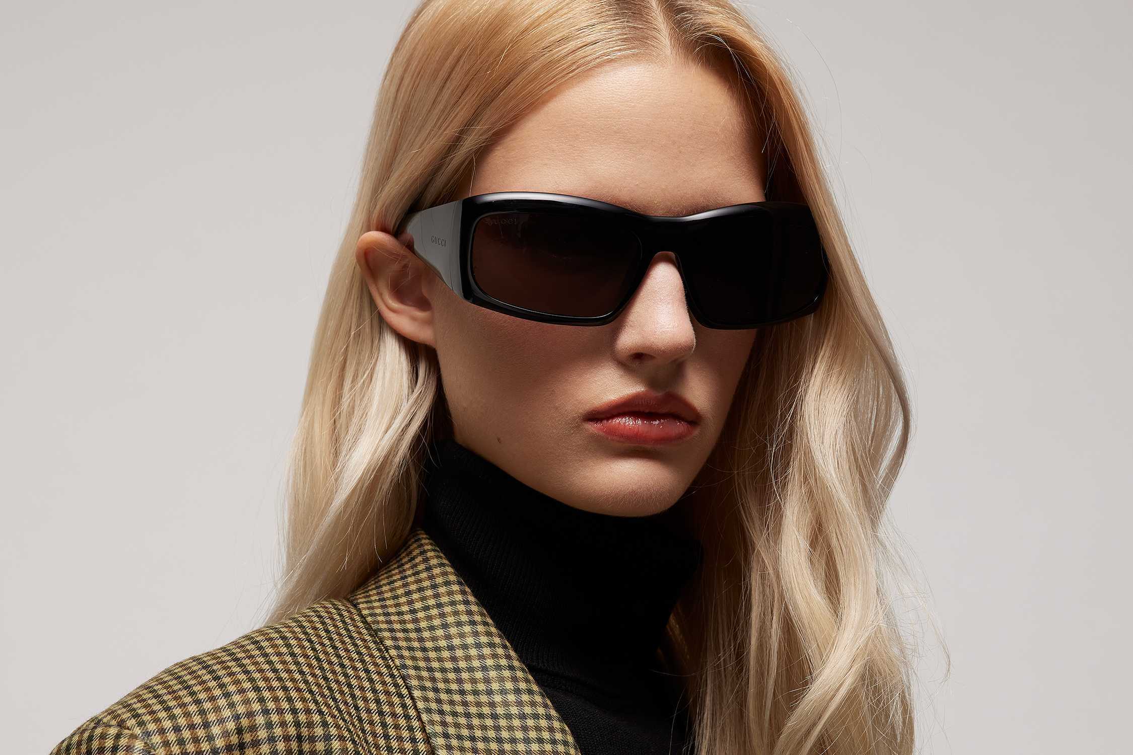 Black Gucci rectangular sunglasses worn