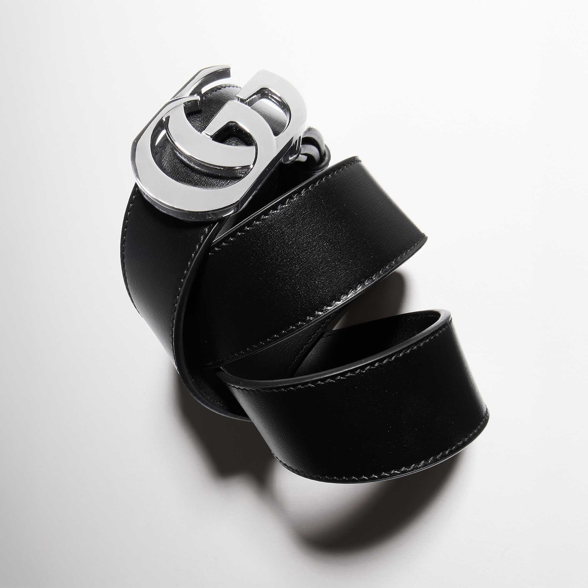 Black Gucci belt gold buckle