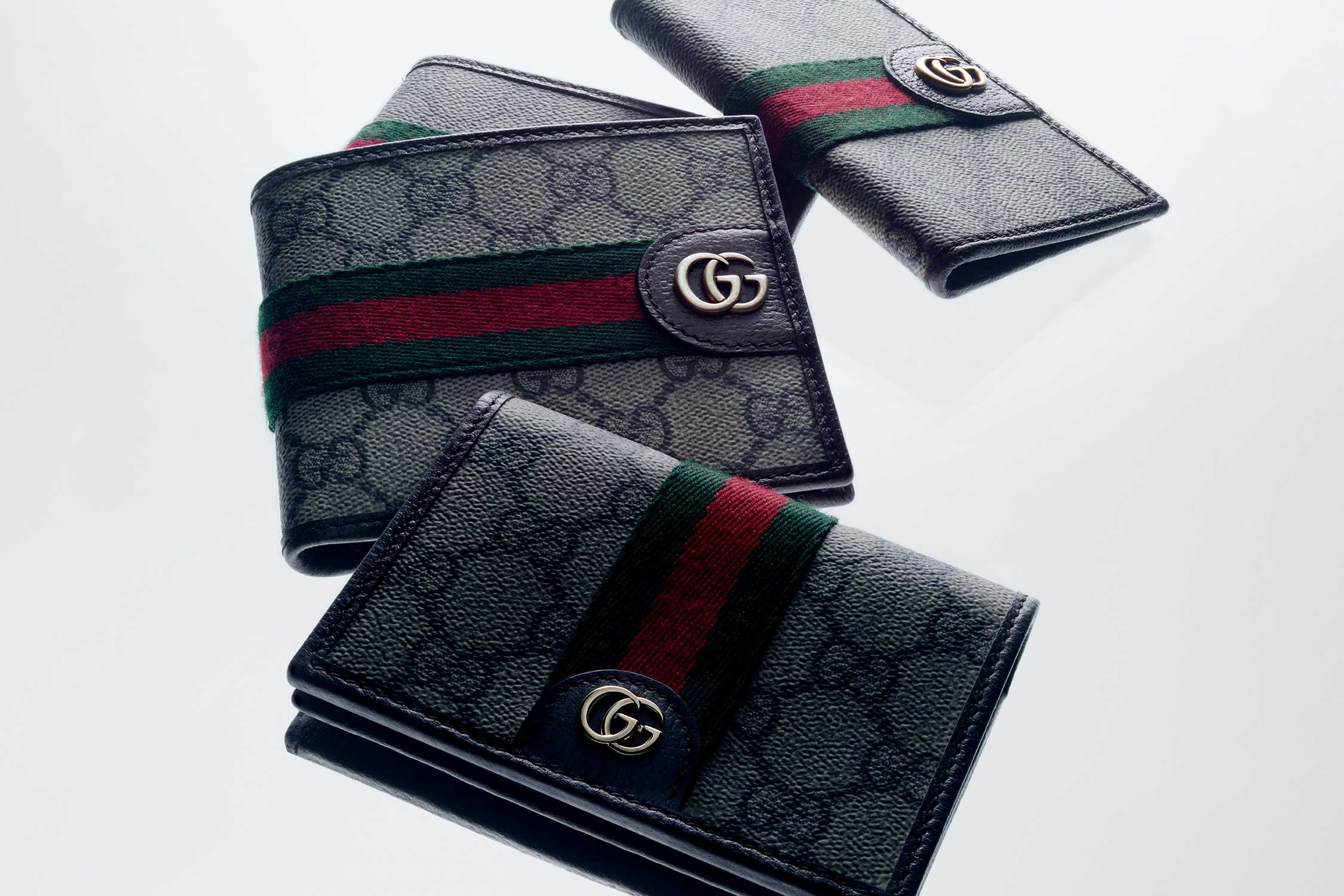 Gucci wallets with red-green stripe