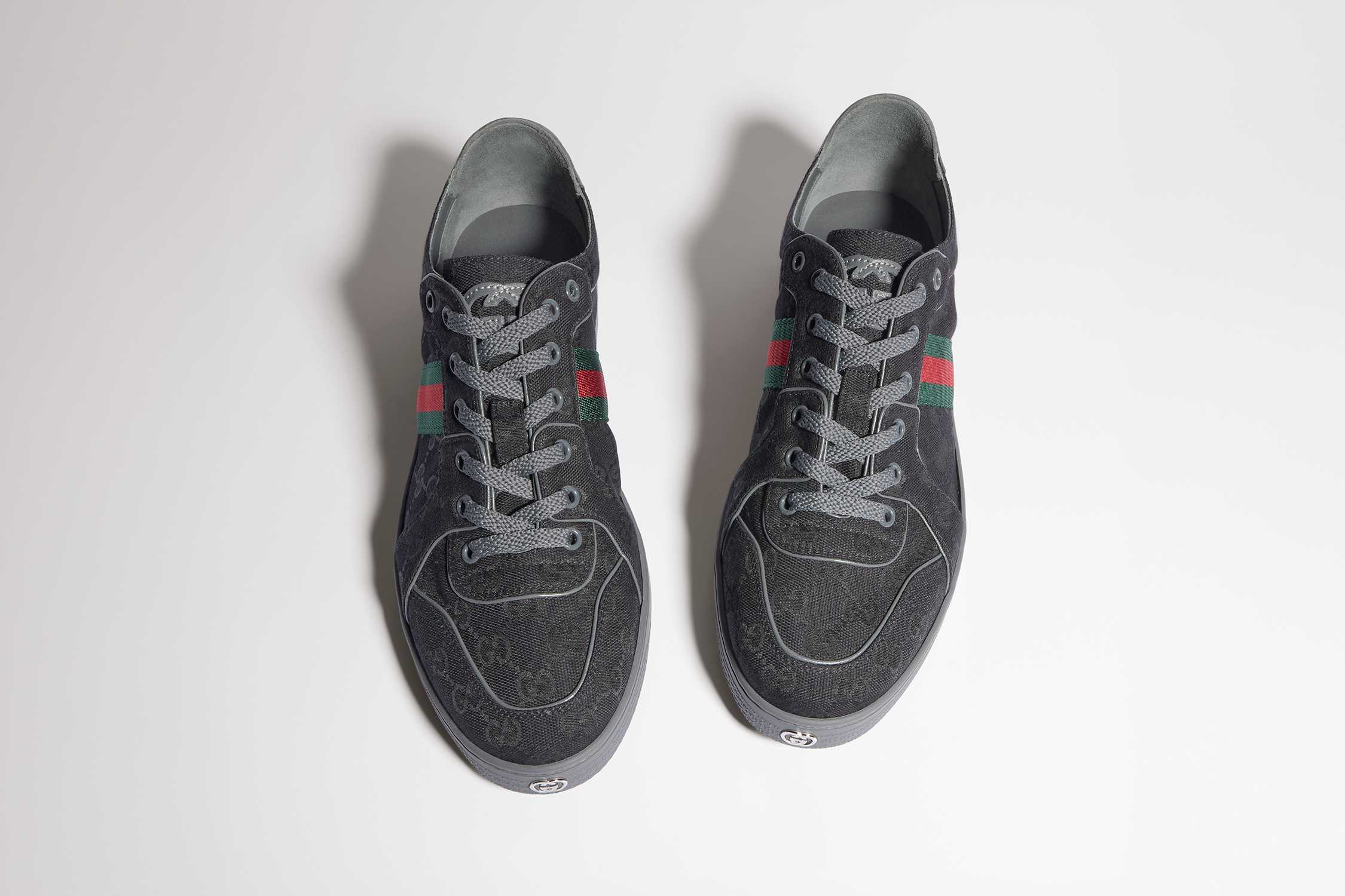Black Gucci sneakers, red-green stripe