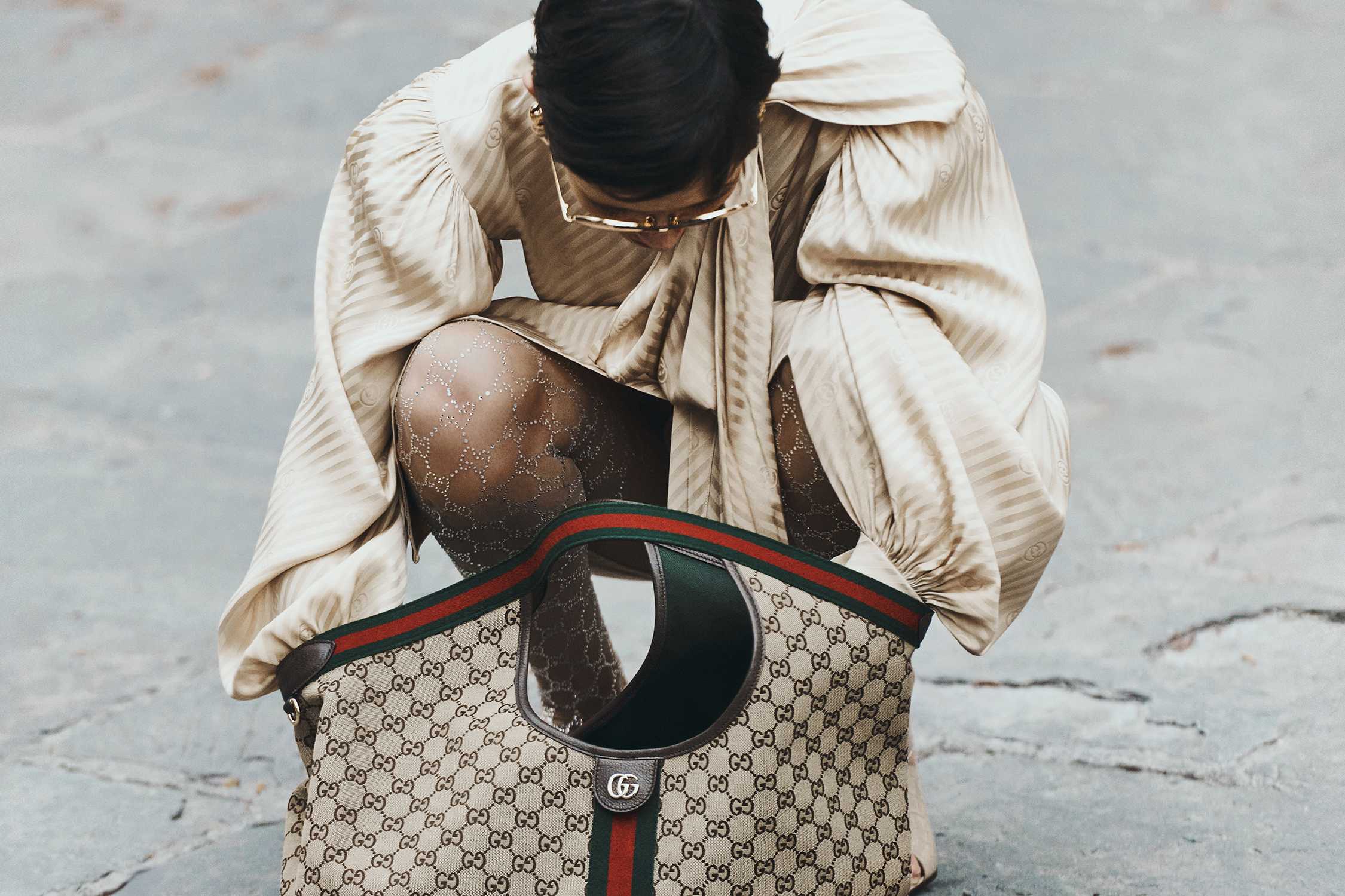 Beige Gucci bag with red-green trim