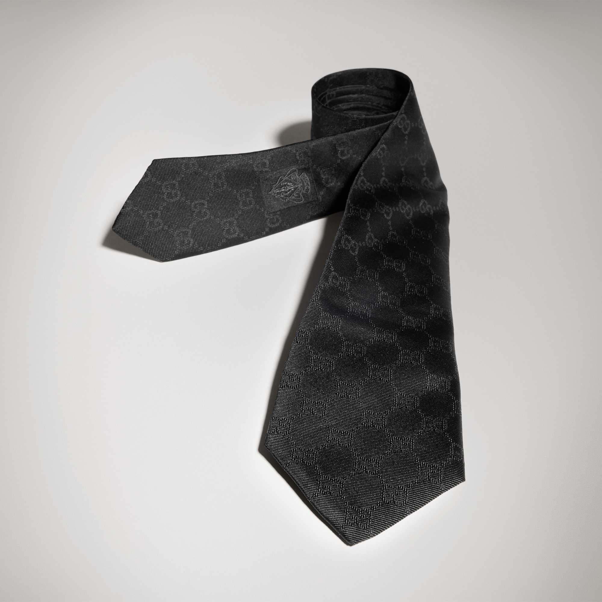 Navy Gucci jacket with tie