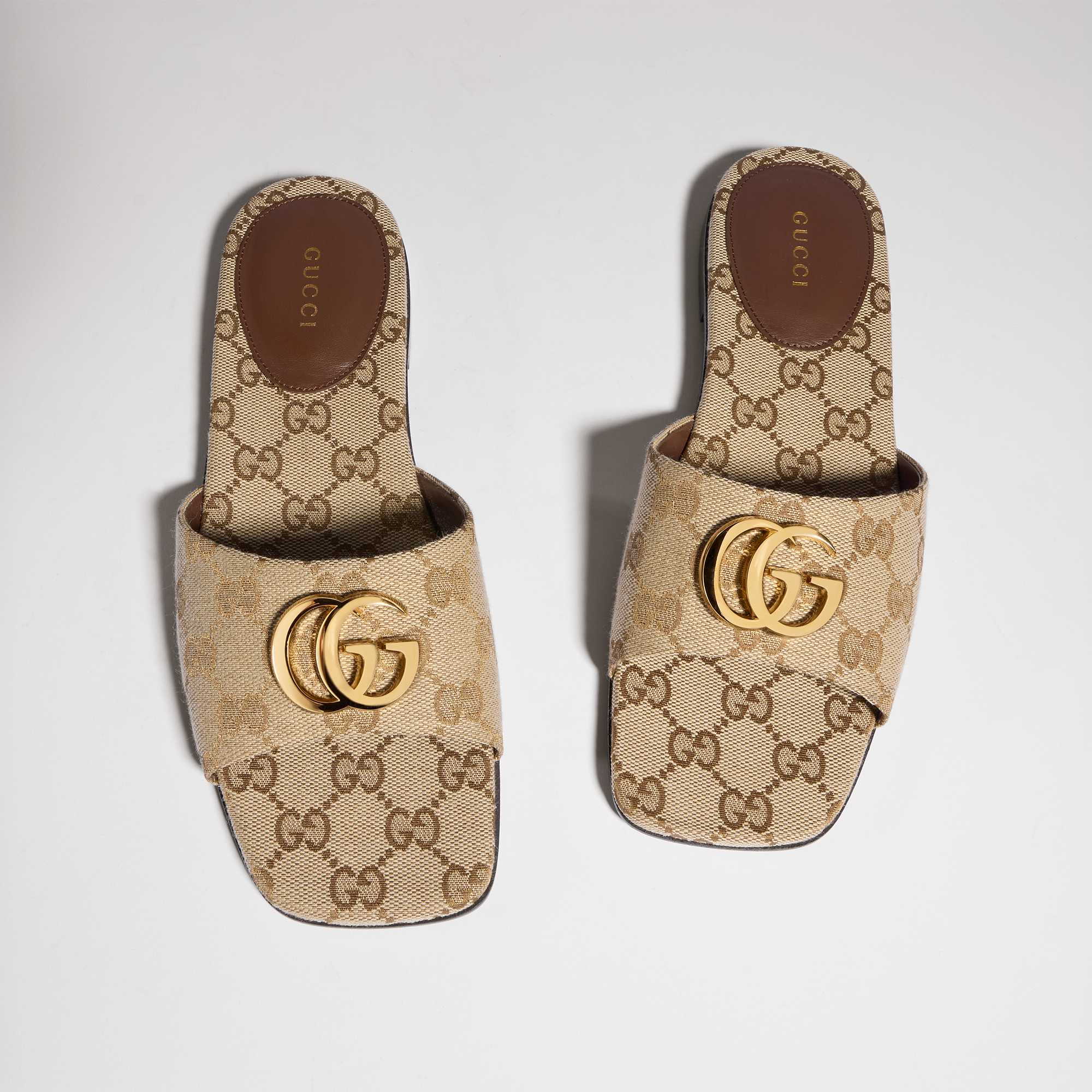 Beige Gucci GG canvas slides