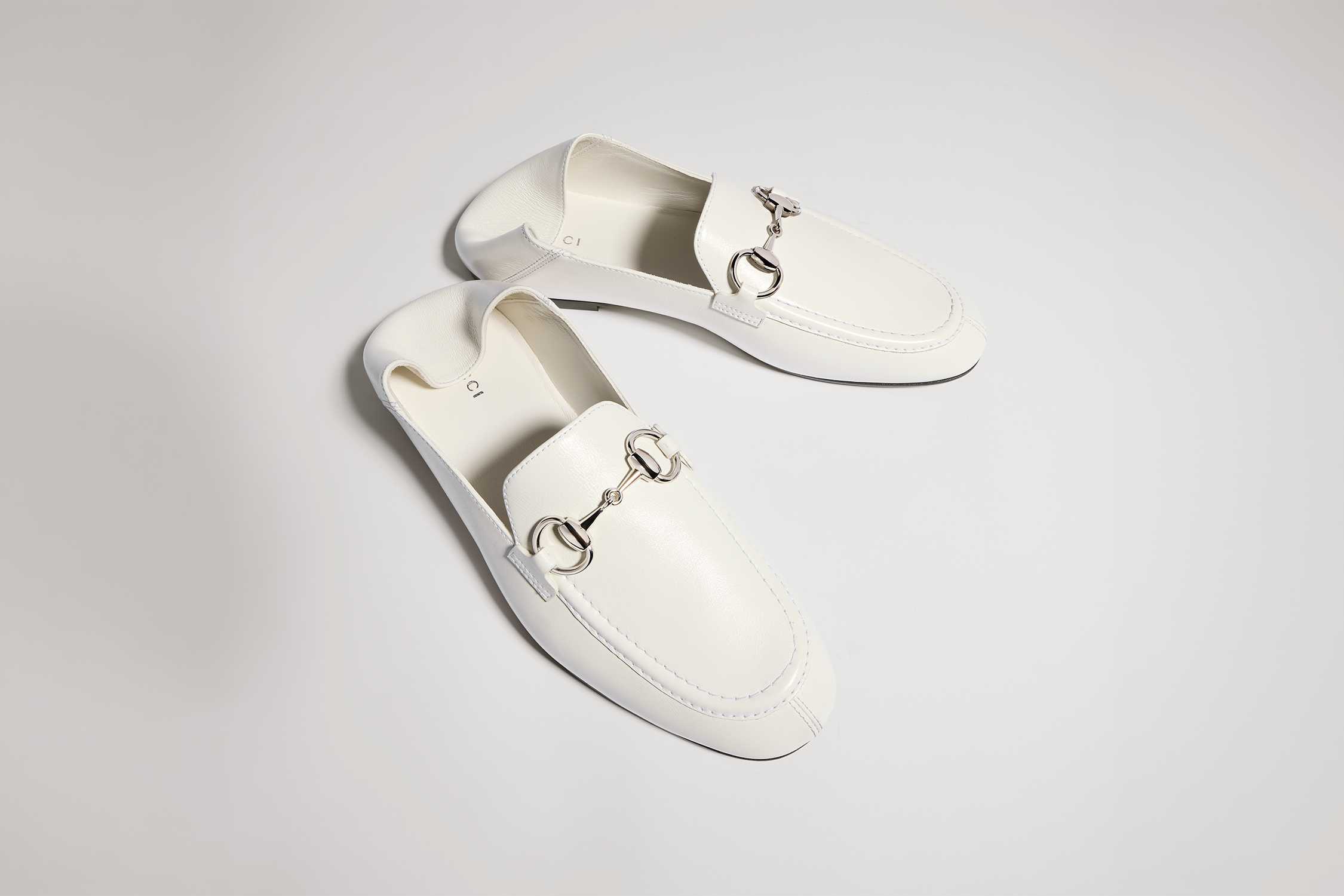 White Gucci Horsebit leather mules