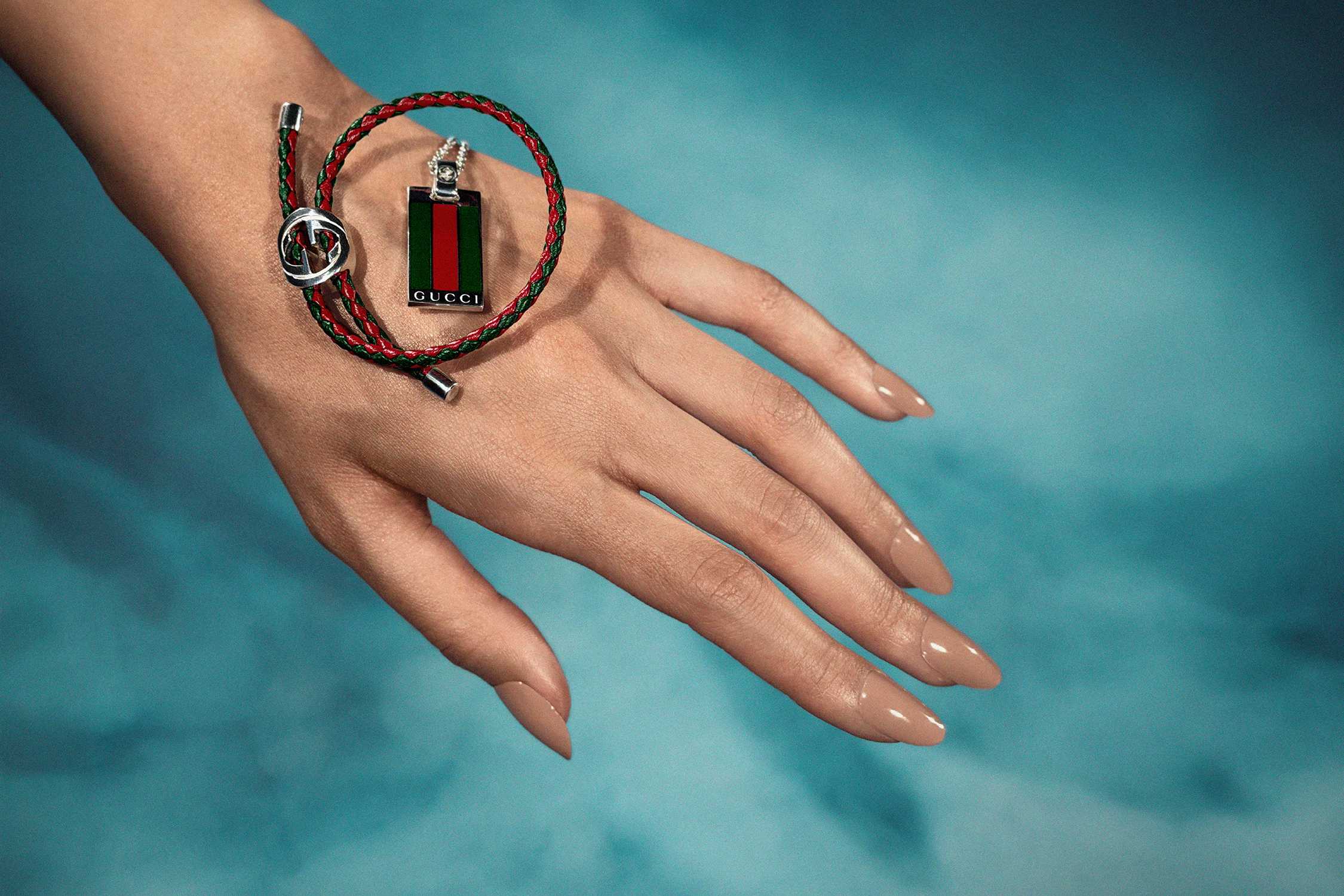 Gucci red-green bracelet on hand