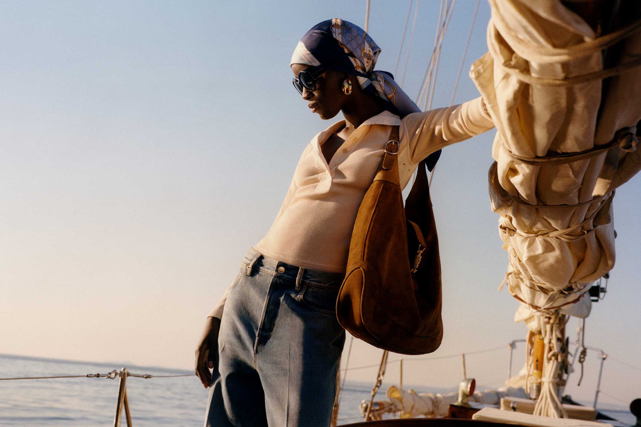 Brown Gucci handbag on yacht