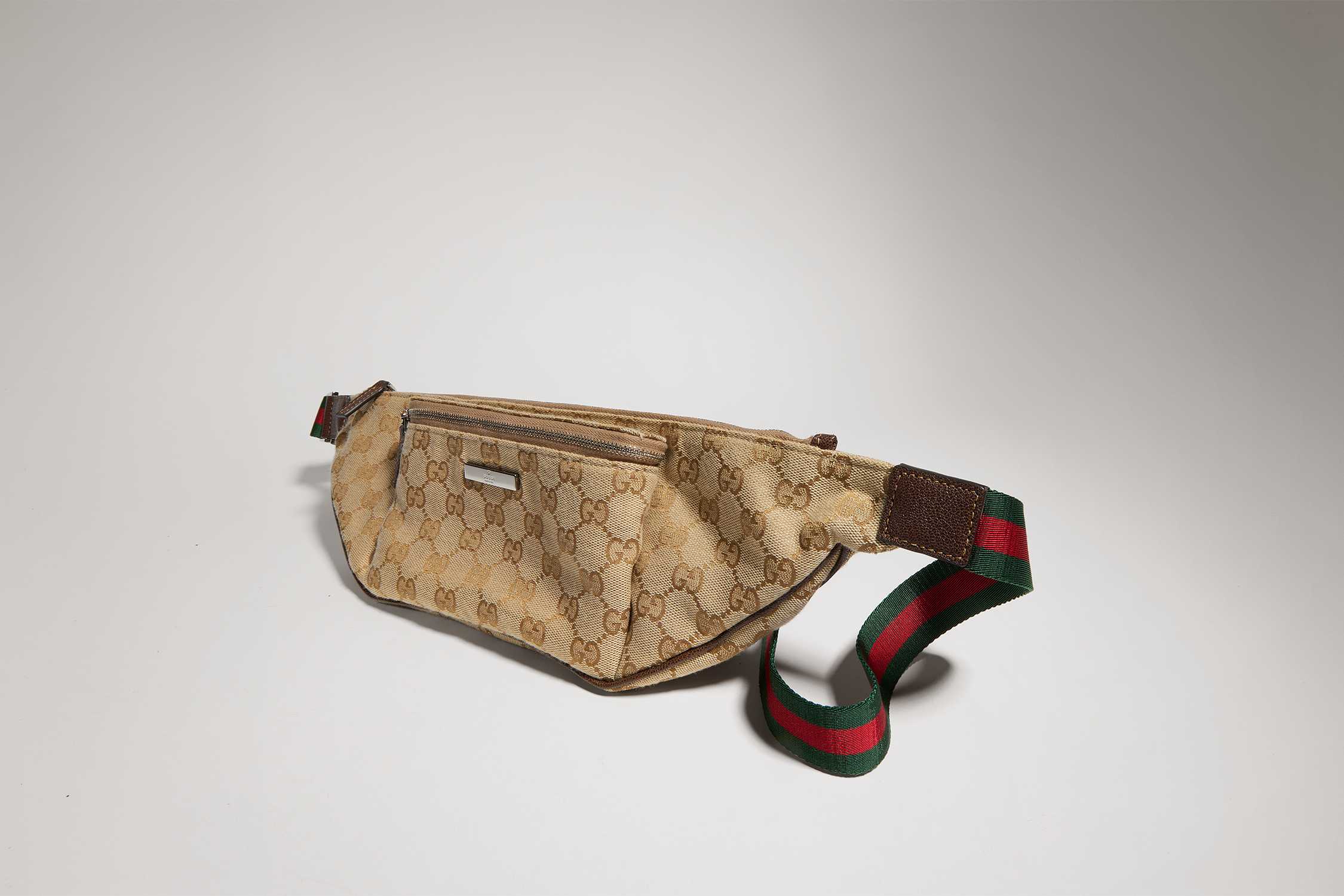 Beige Gucci GG canvas belt bag