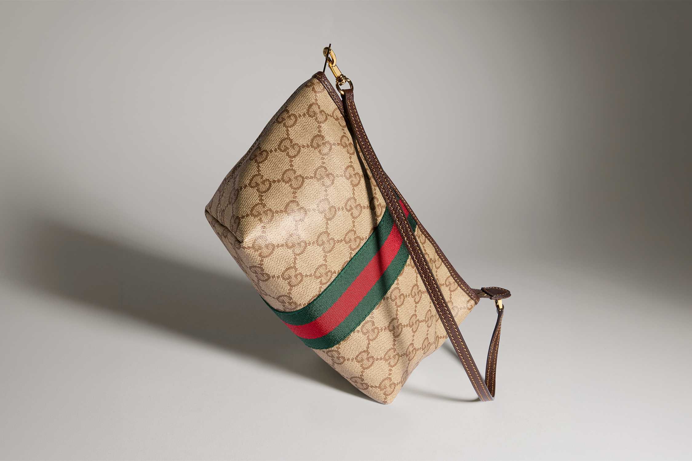 Beige Gucci bag with stripes