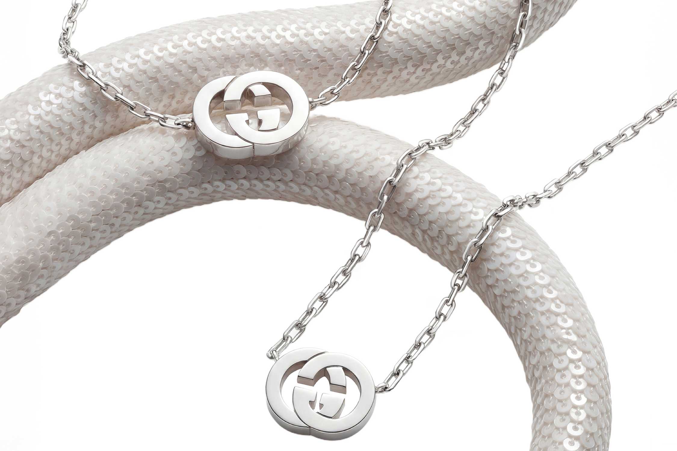 Silver Gucci necklaces with pendants