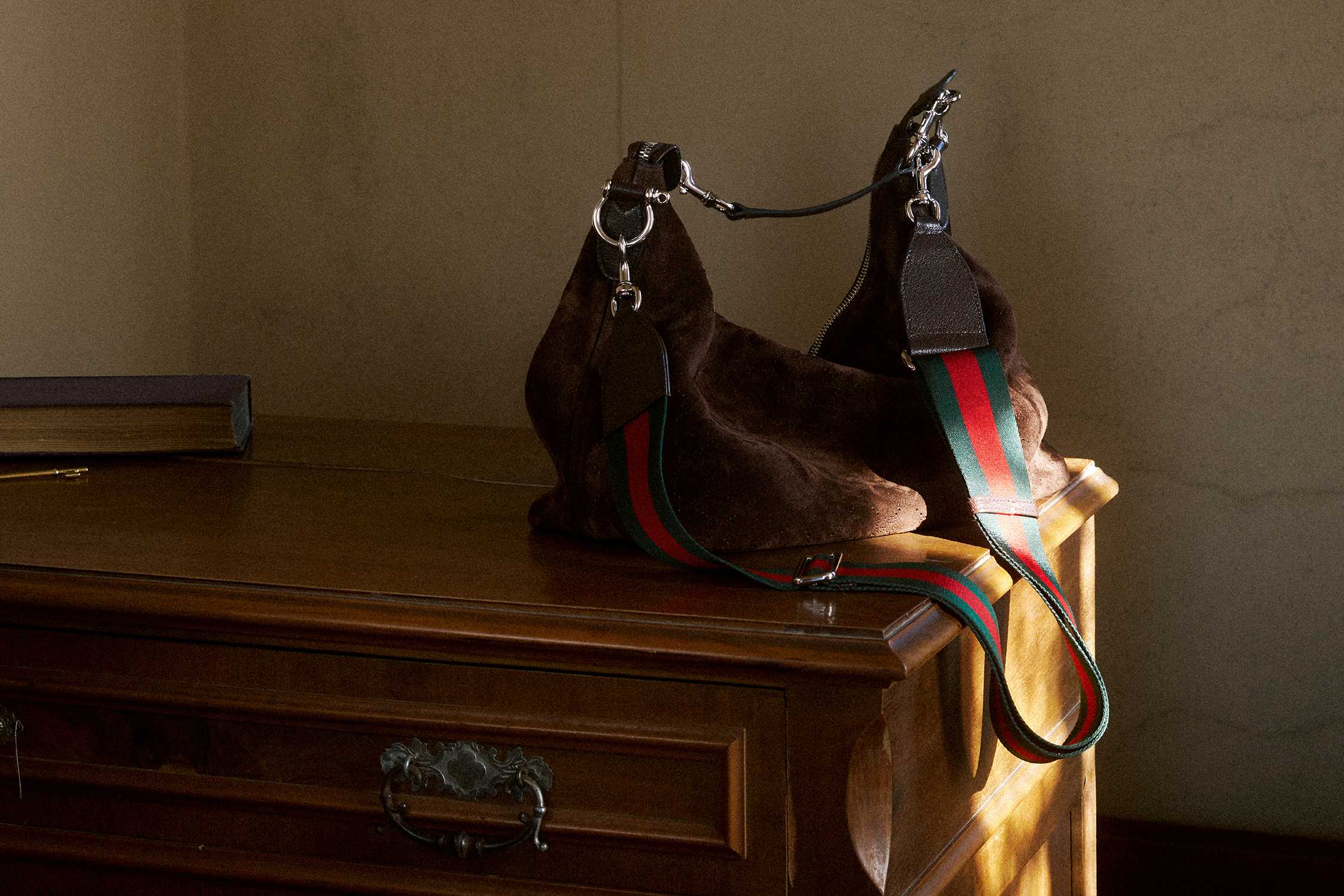 Brown Gucci suede bag, striped strap