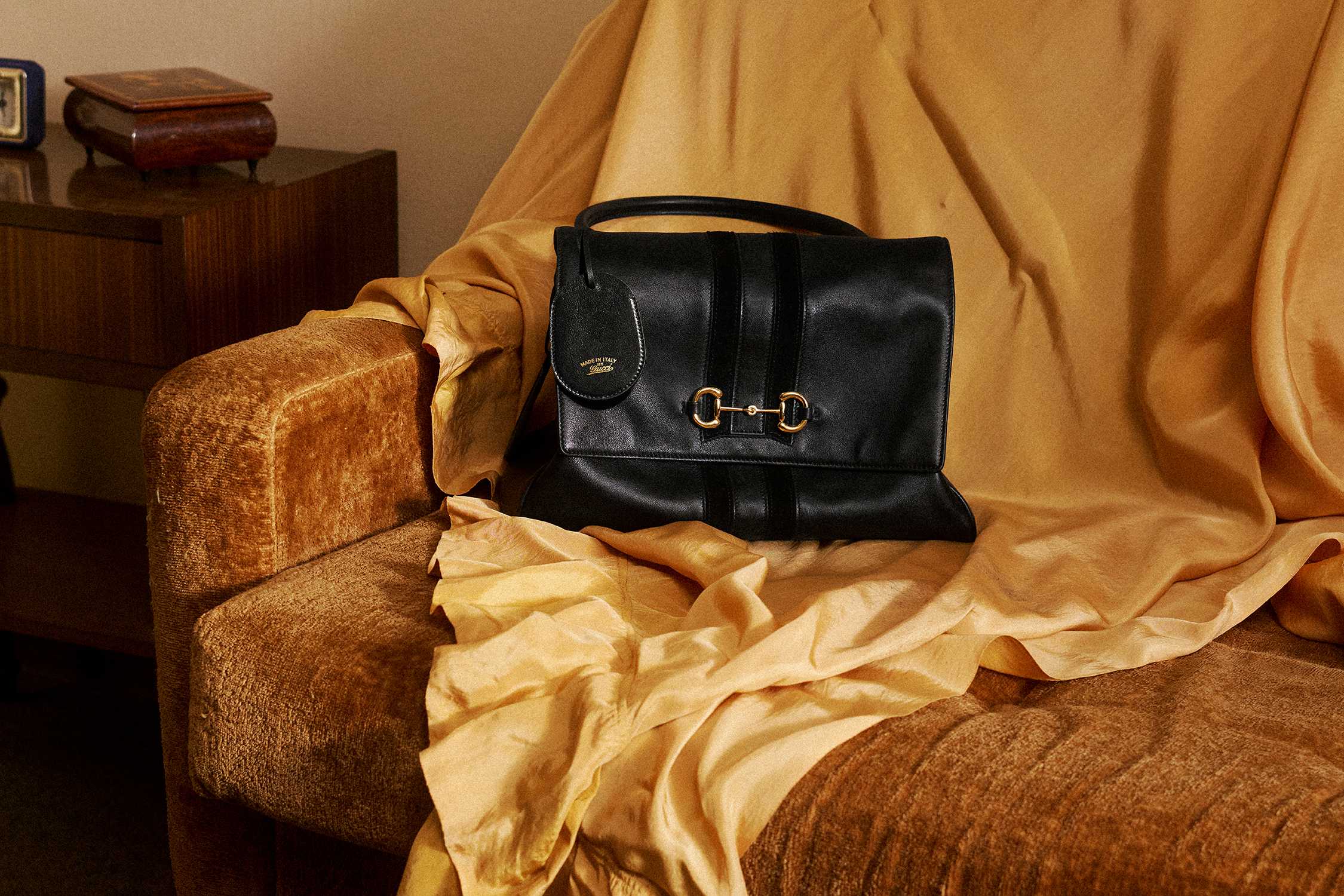 Black Gucci horsebit leather bag
