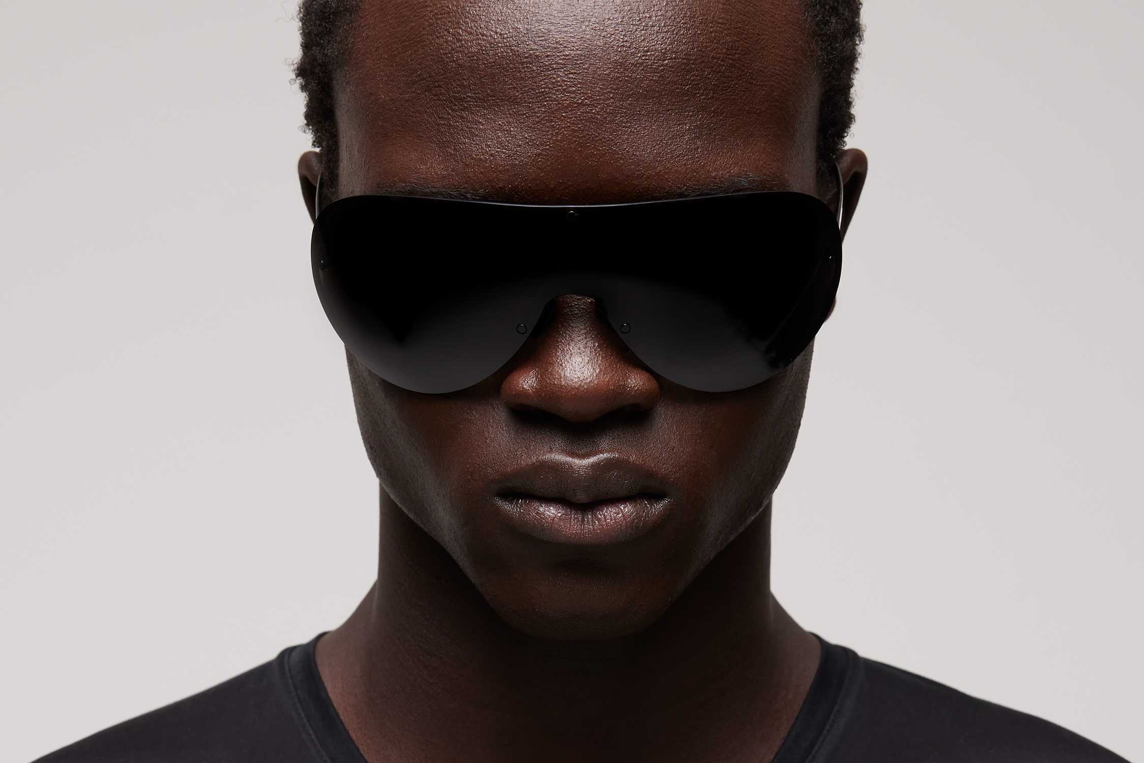 Black Gucci shield sunglasses worn