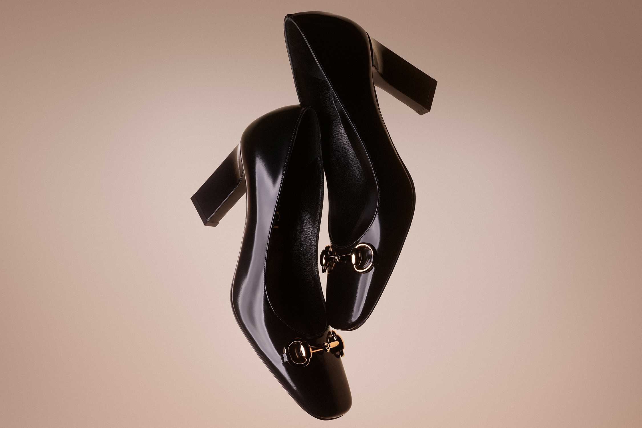Black Gucci heels with horsebit