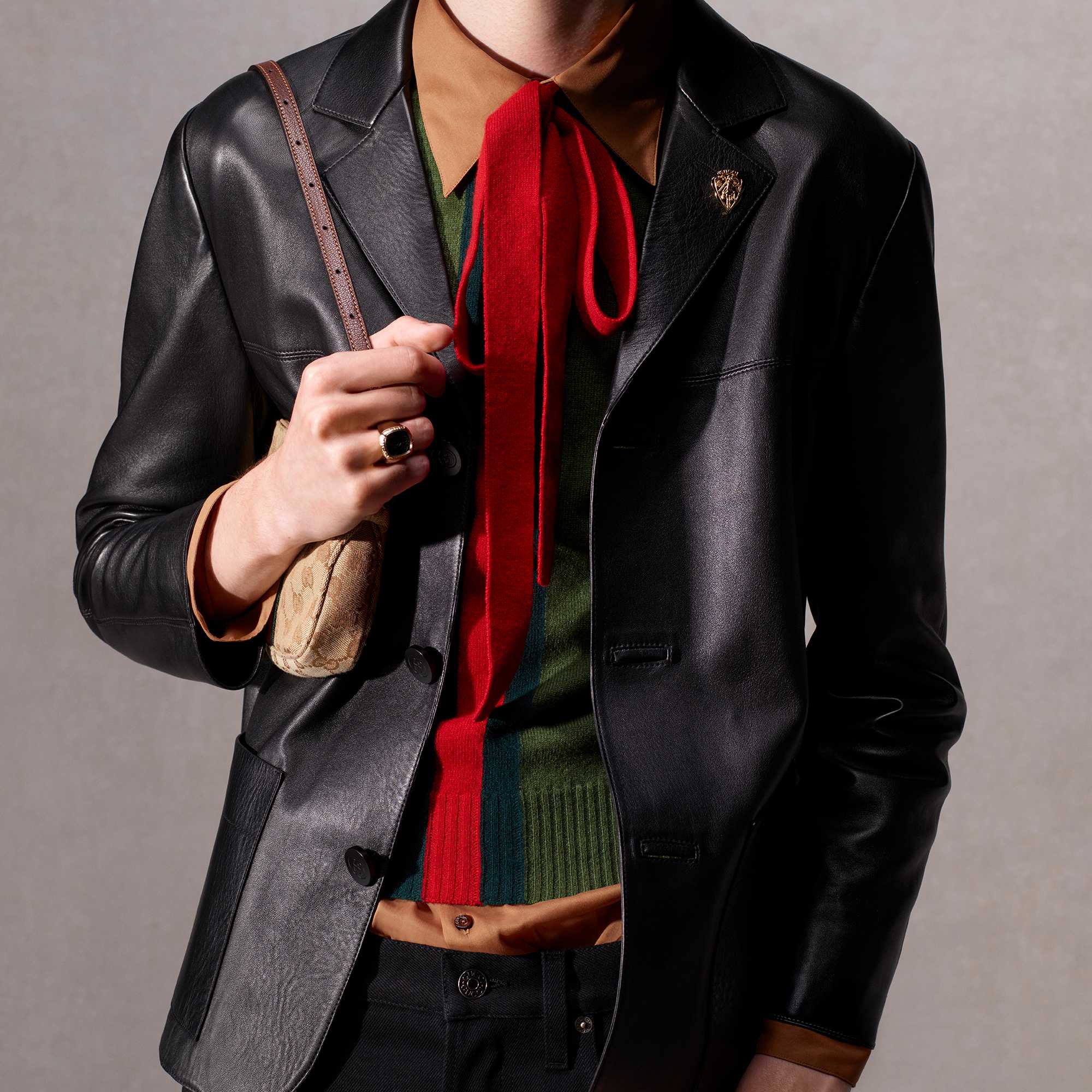 Gucci leather jacket with knit top