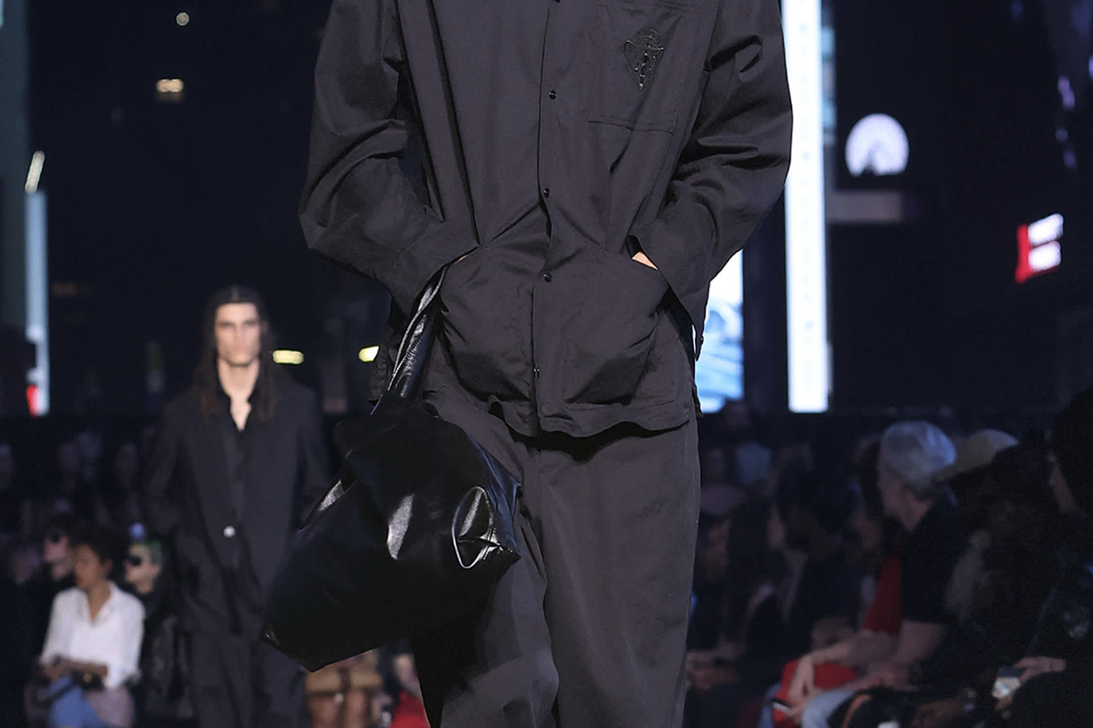 Black Gucci shirt and bag