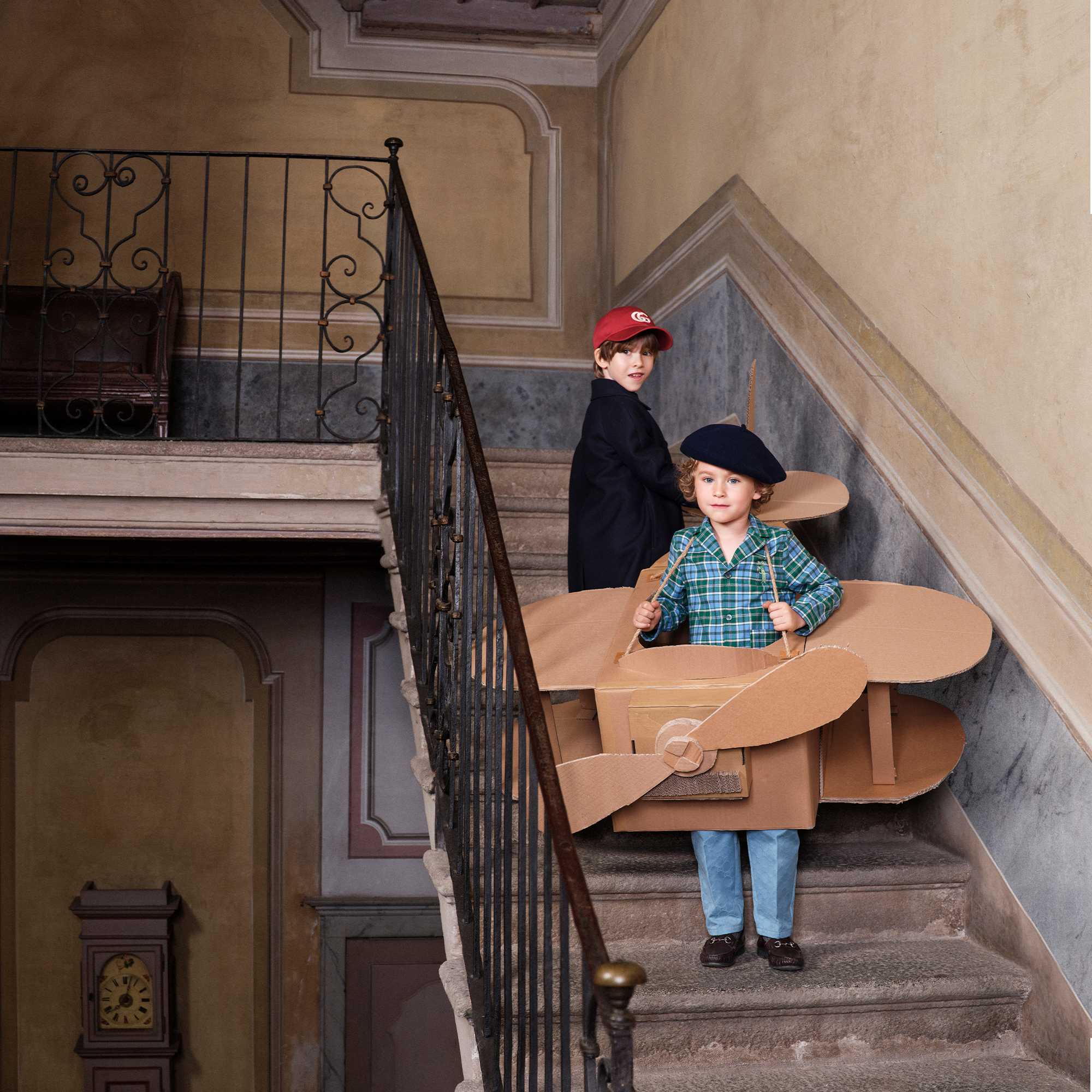 Children in Gucci red cap