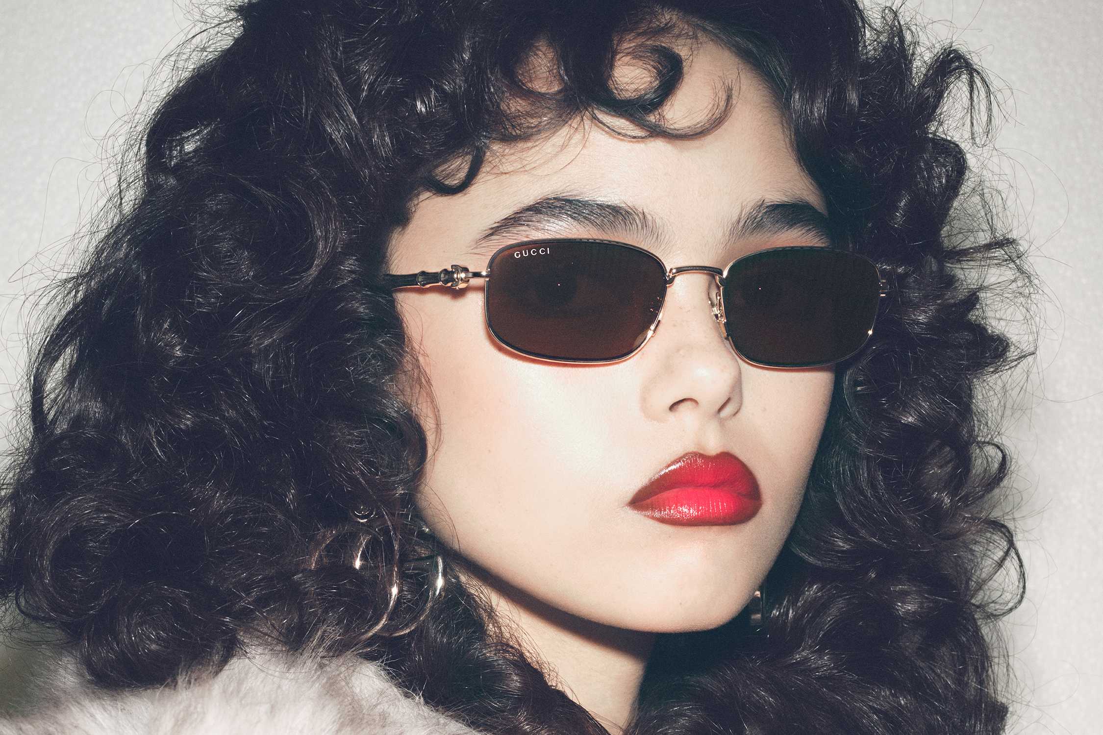 Gold-framed Gucci brown sunglasses