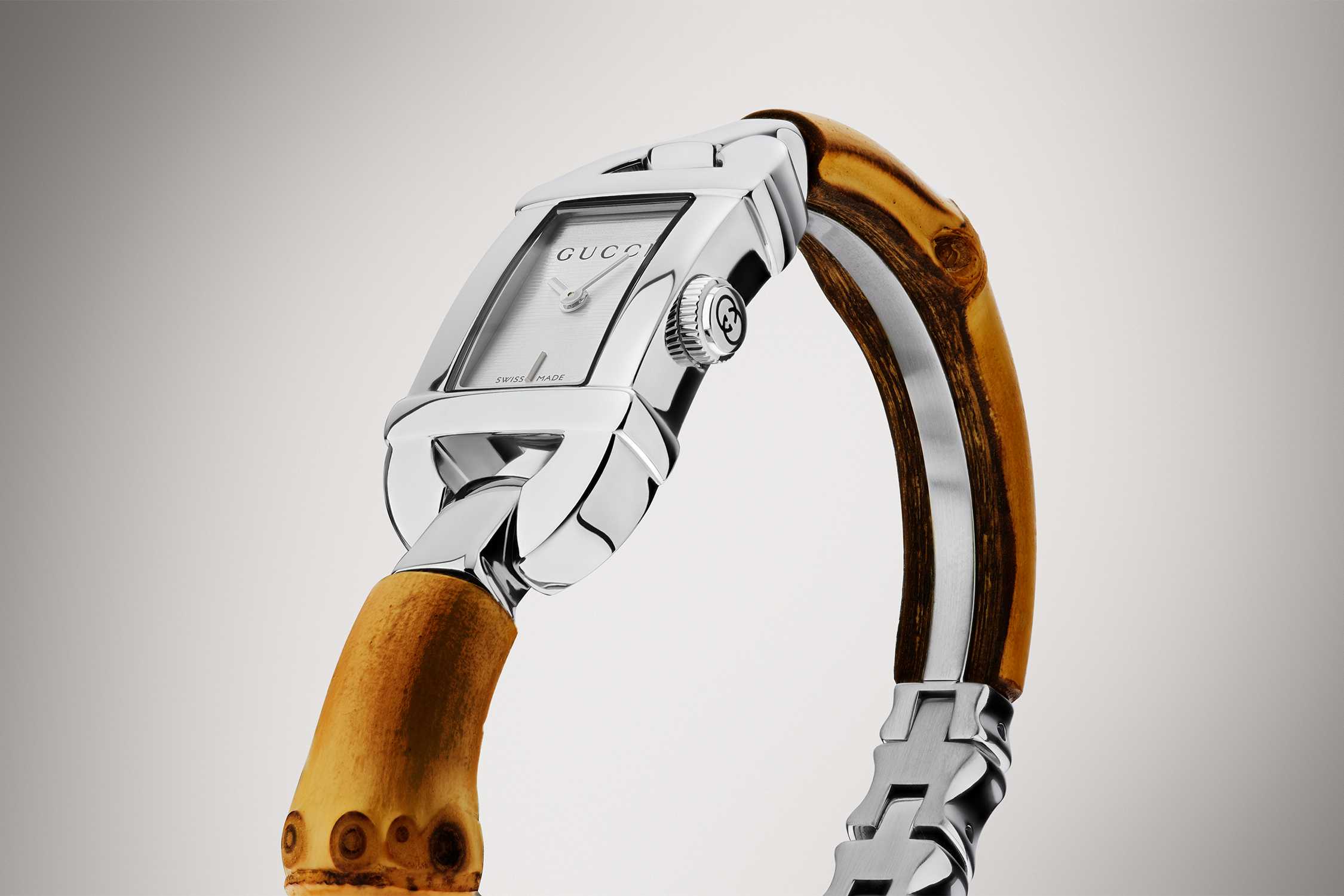Silver Gucci watch, brown strap