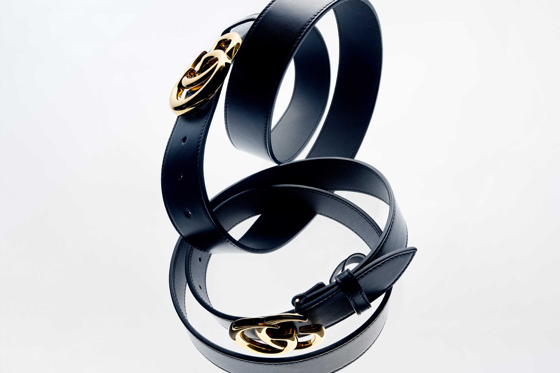 Black Gucci belts gold buckles