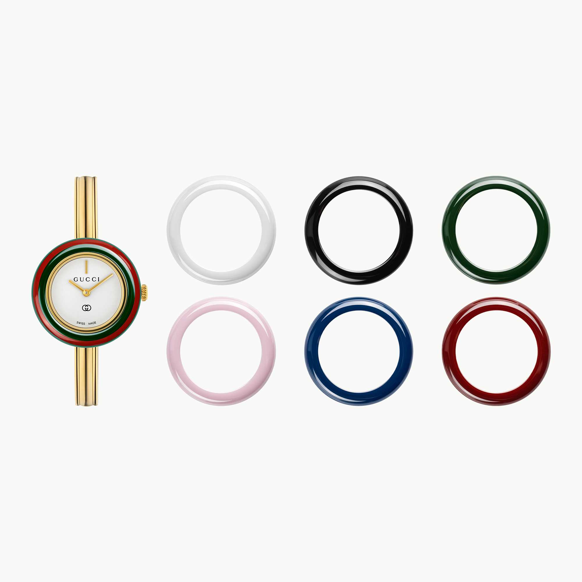 Silver Gucci watch gold bezel