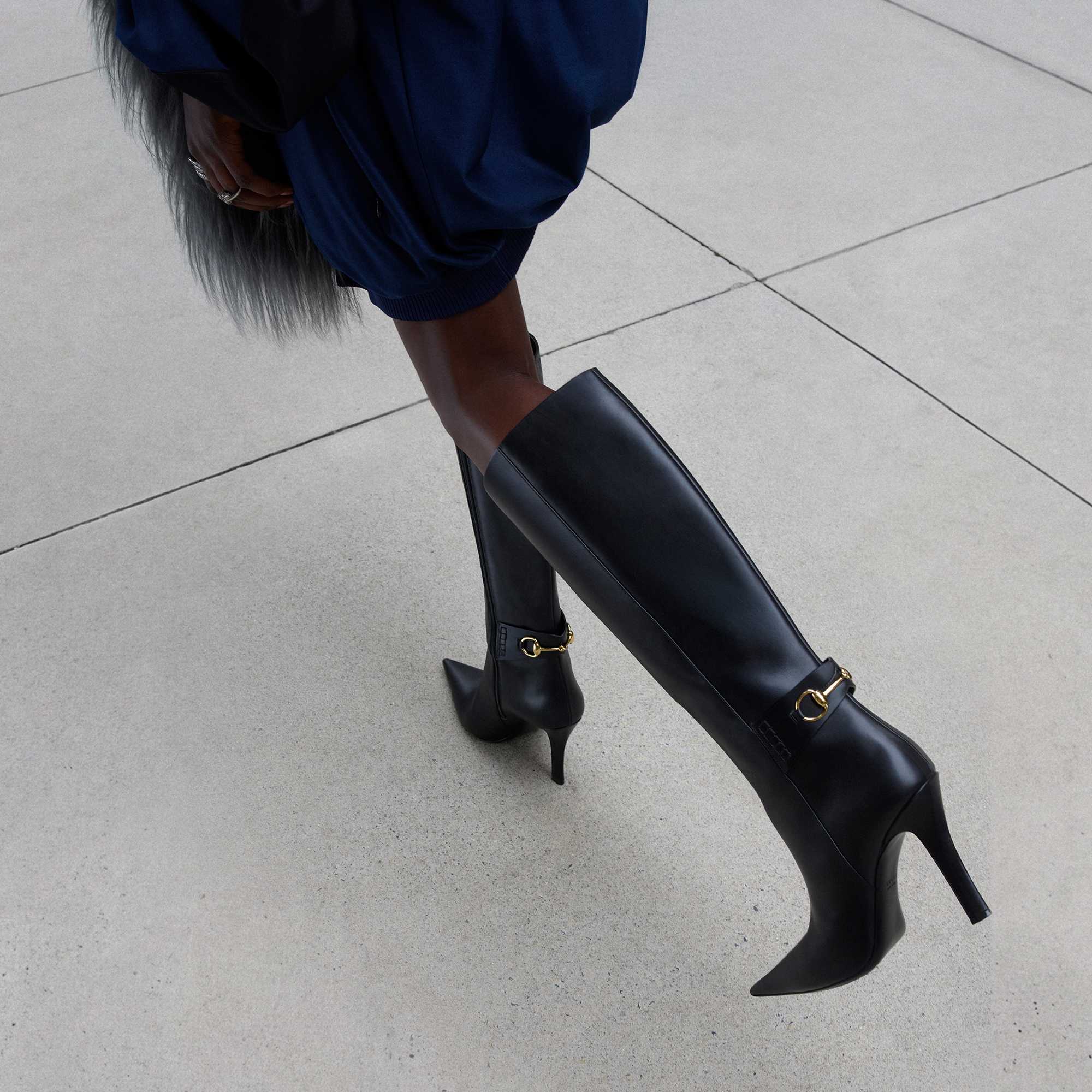 Black Gucci pointed toe boots