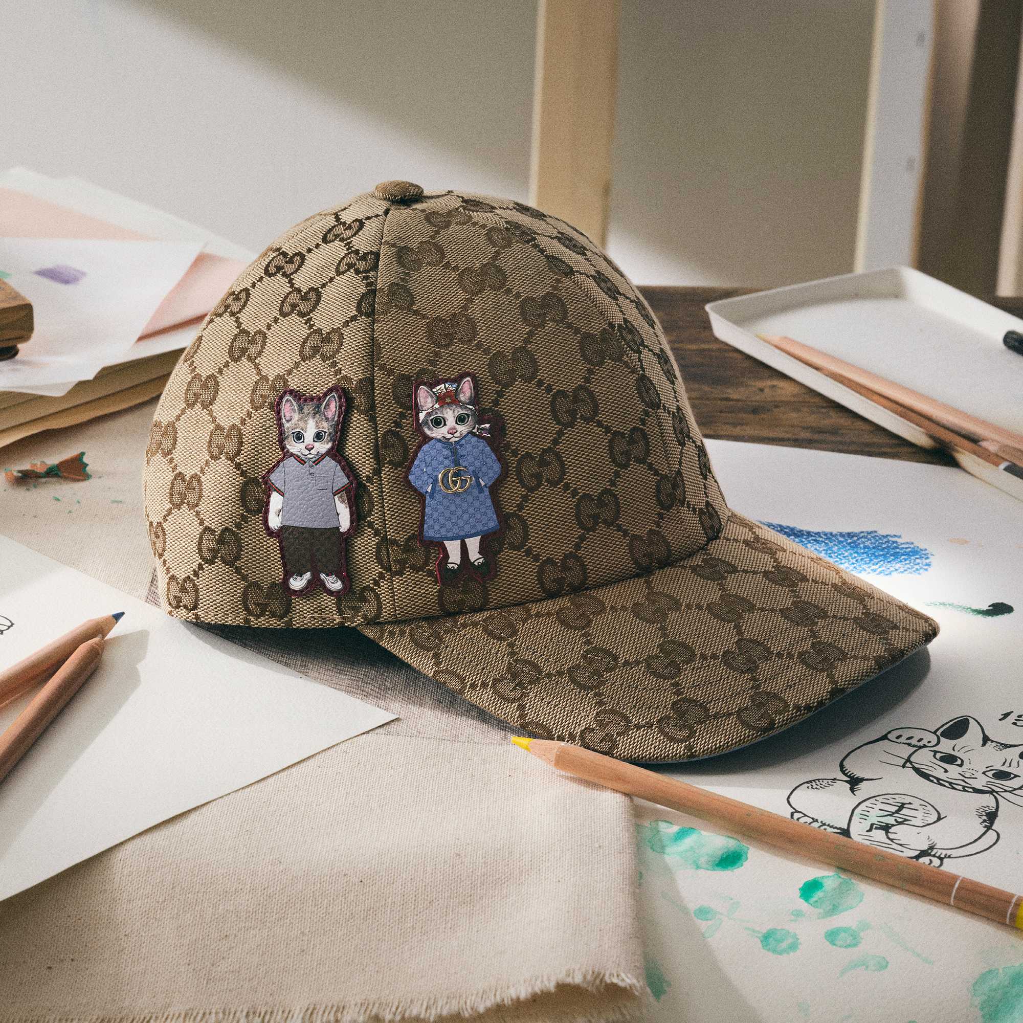 Beige Gucci cap with cats
