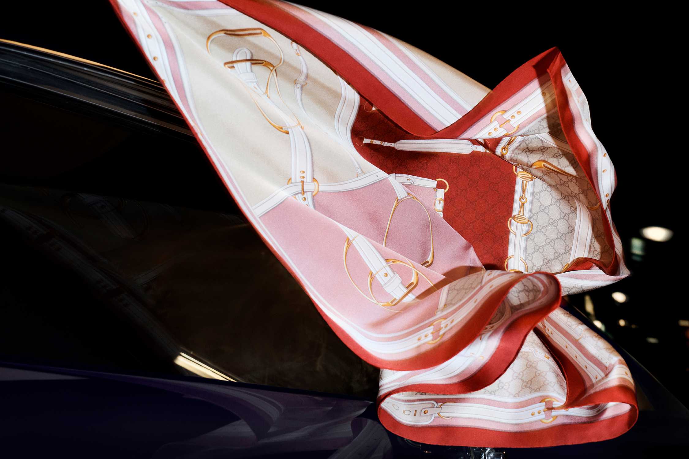 Red Gucci silk scarf flowing