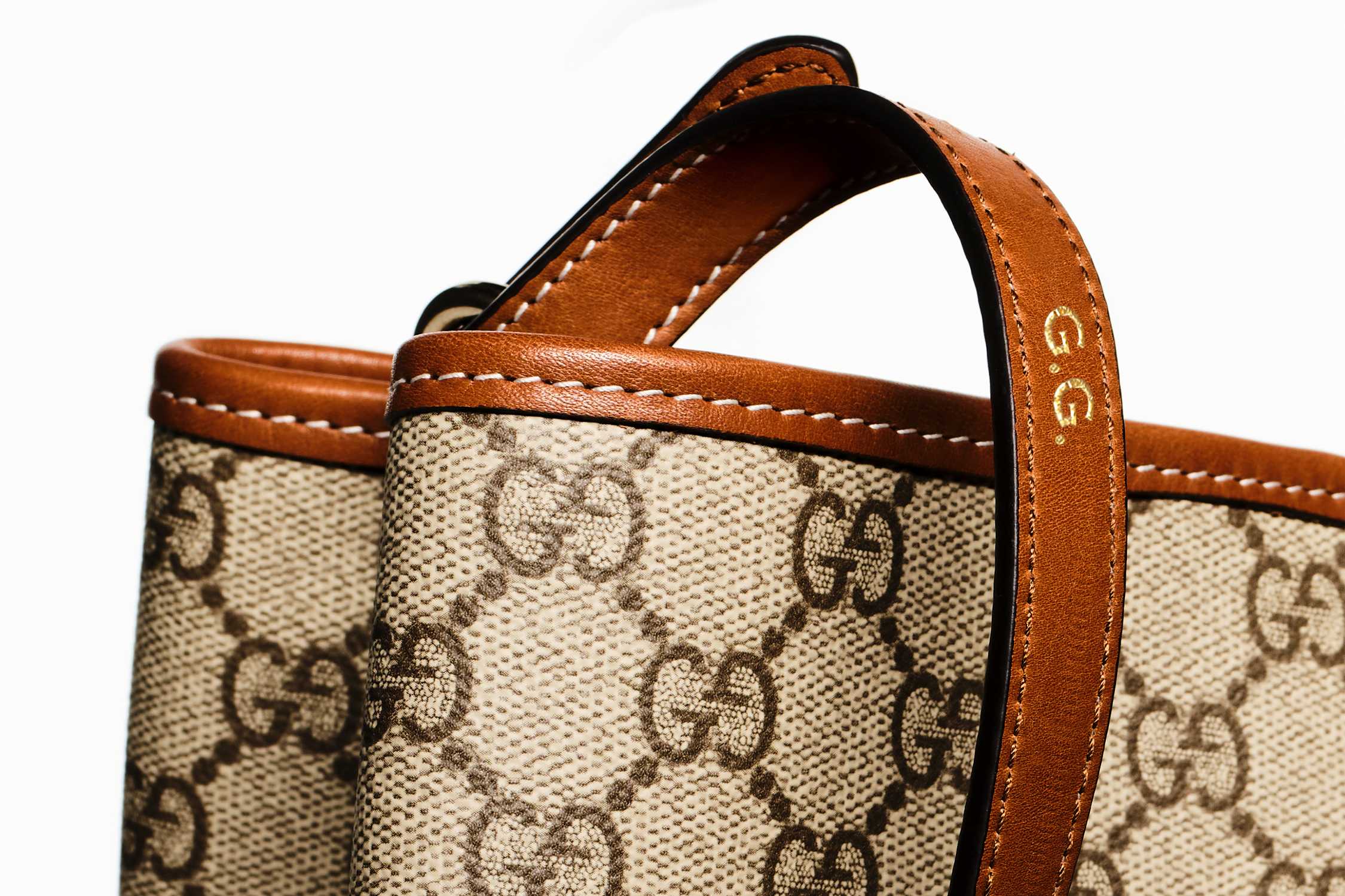 Brown leather Gucci monogram handbag