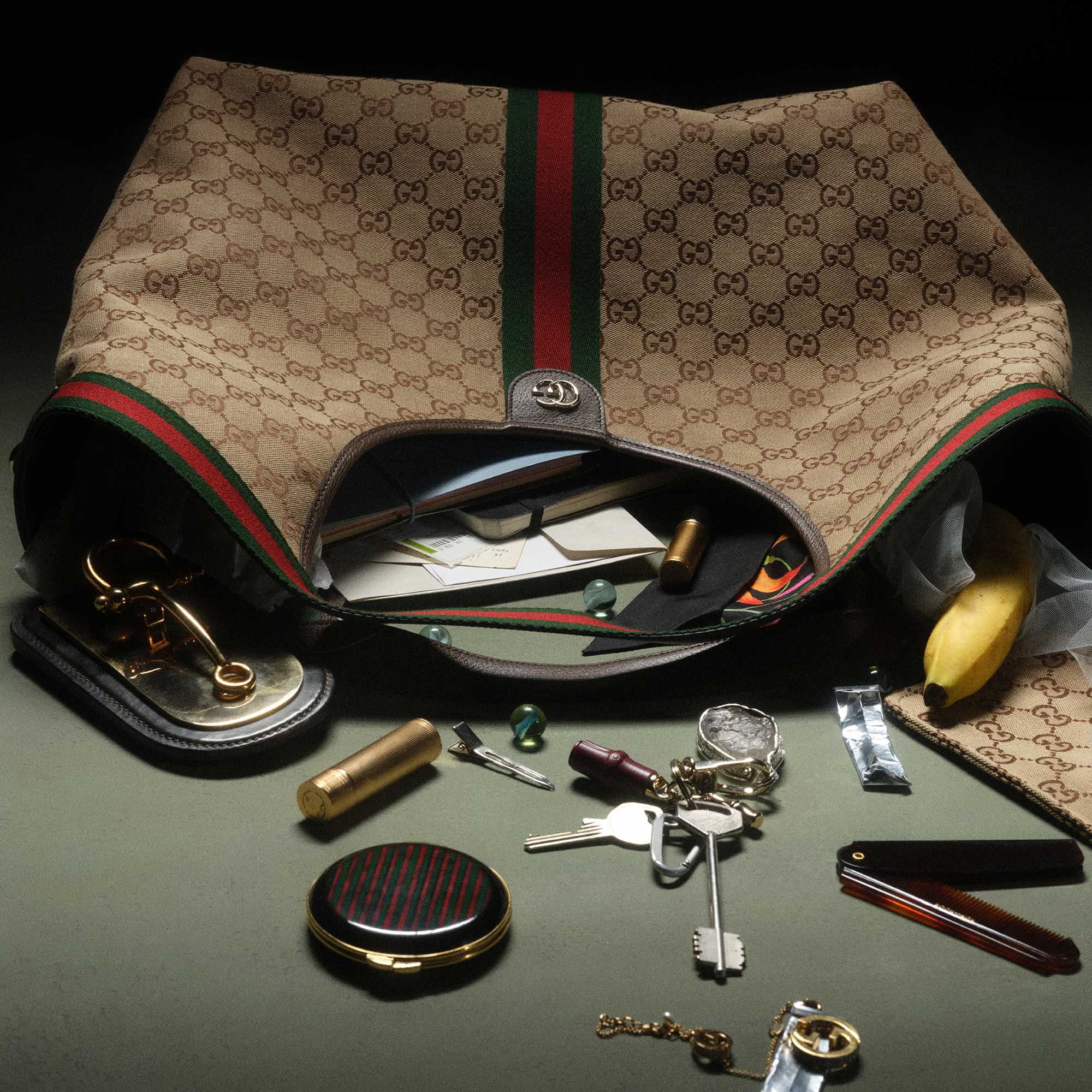 Beige Gucci bag with contents