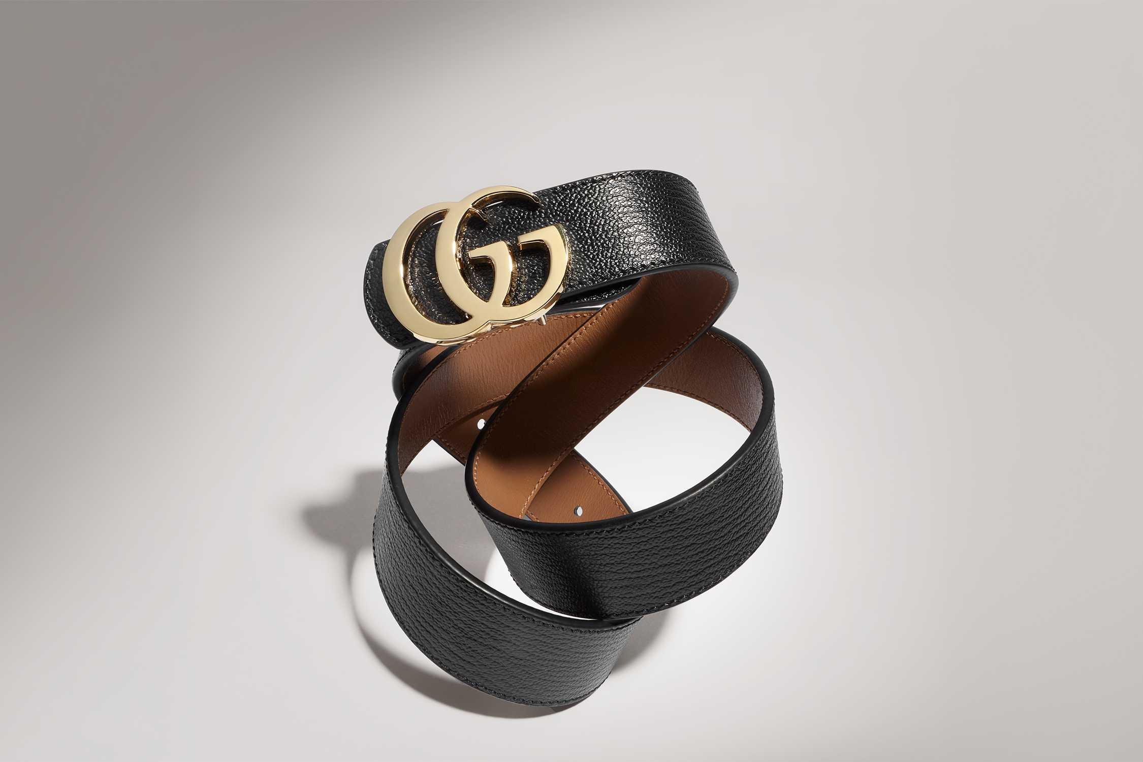 Black Gucci belt gold buckle