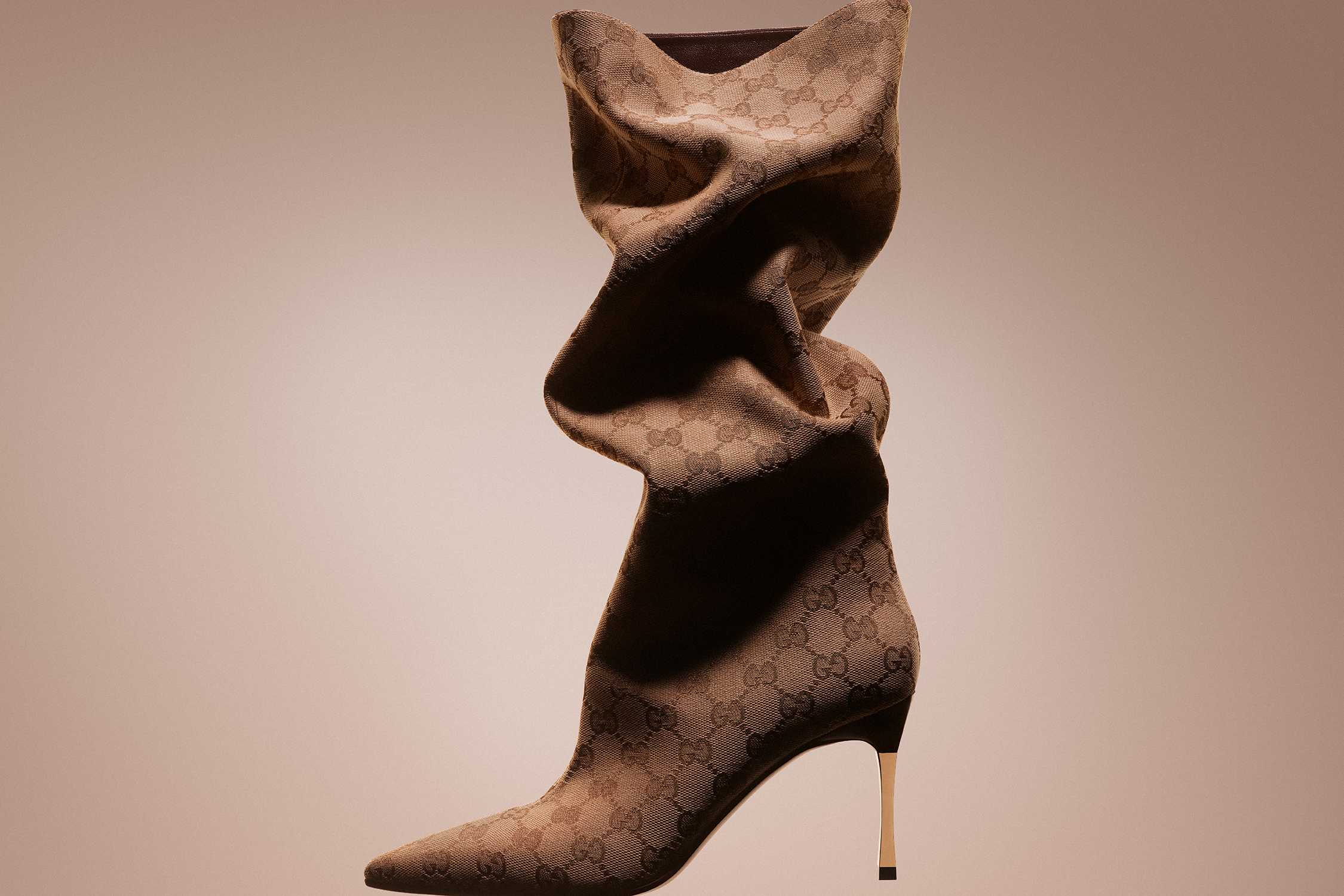 Brown Gucci monogram stiletto boot