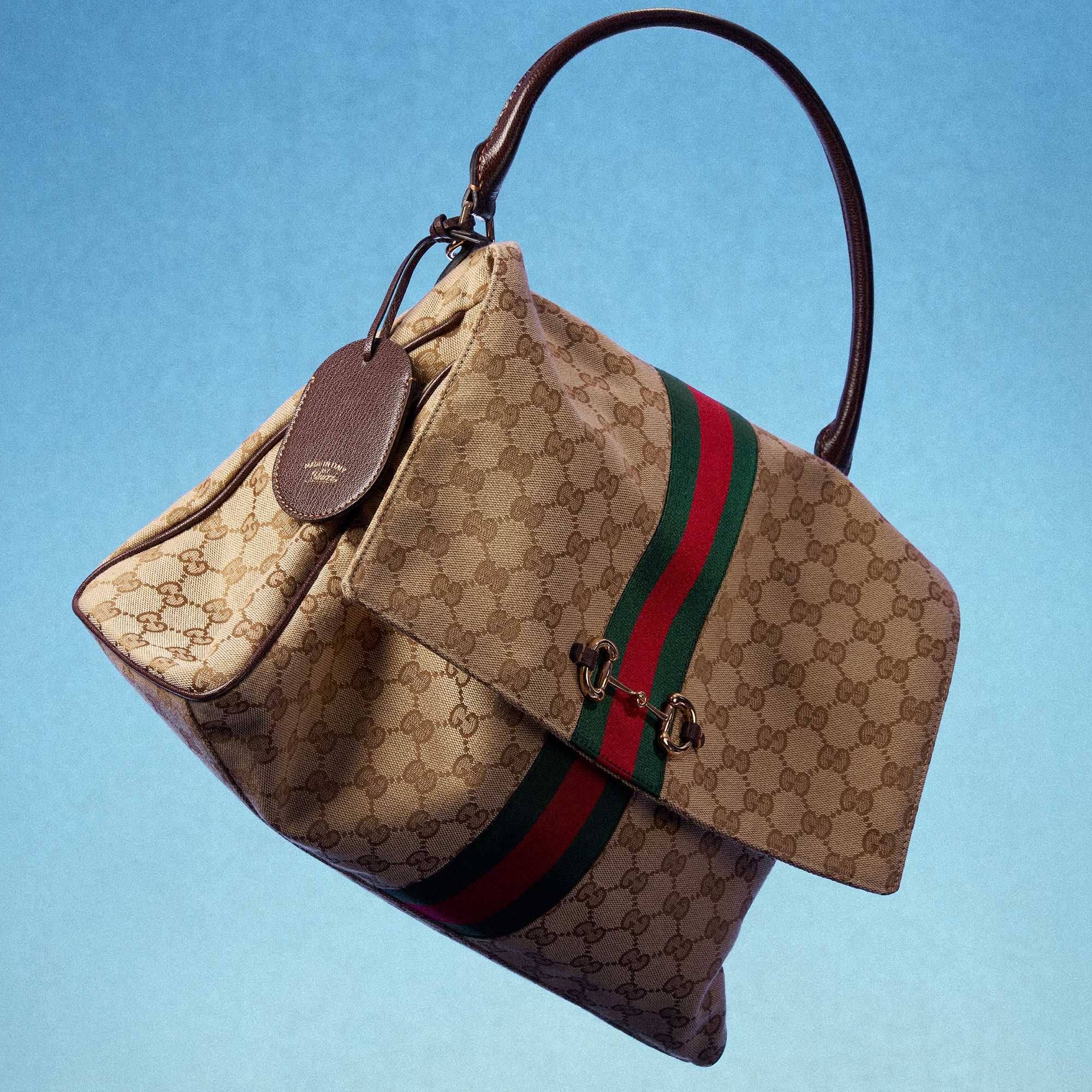 Beige Gucci GG monogram handbag