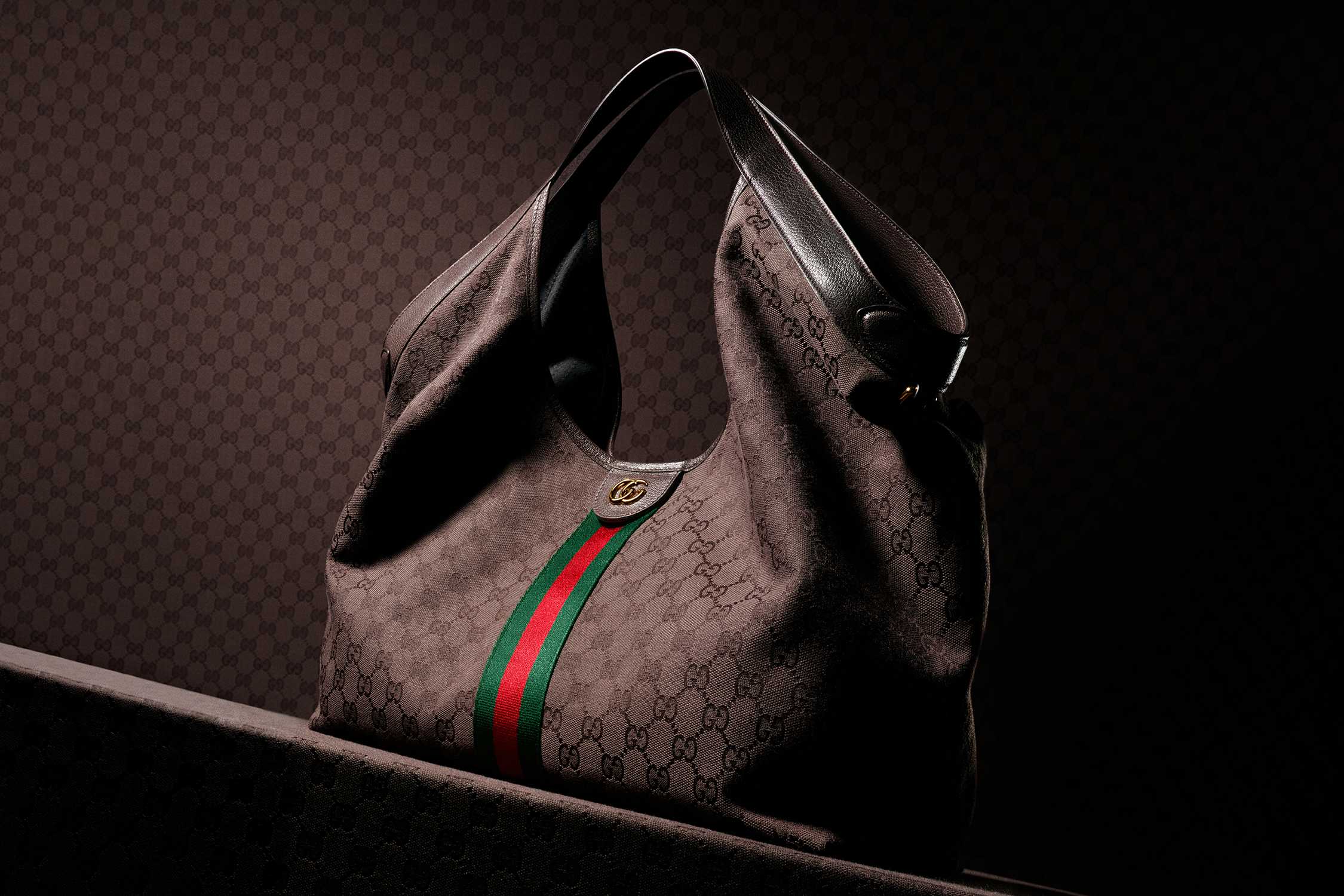 Brown Gucci bag with stripes