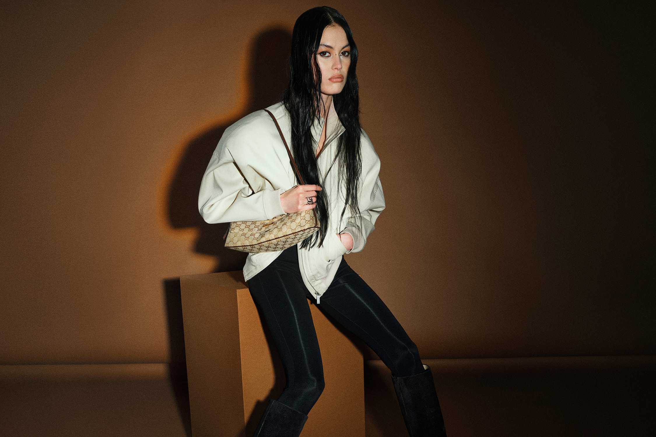 Beige Gucci handbag with jacket