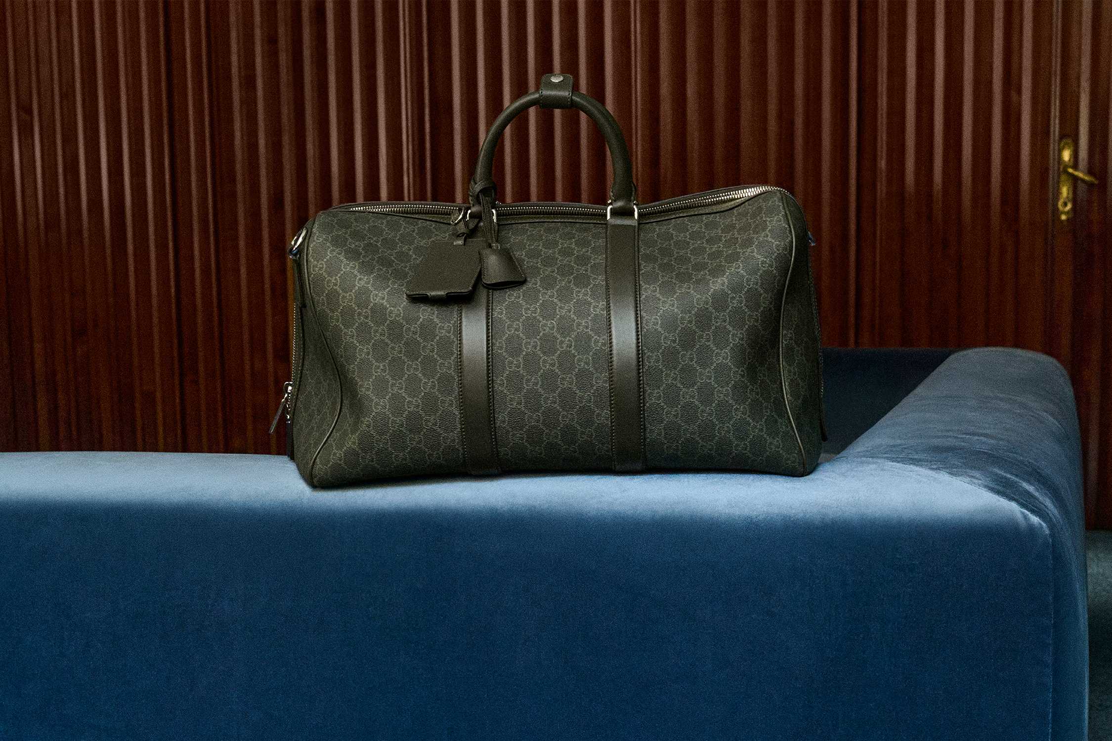 Green Gucci monogram duffle bag