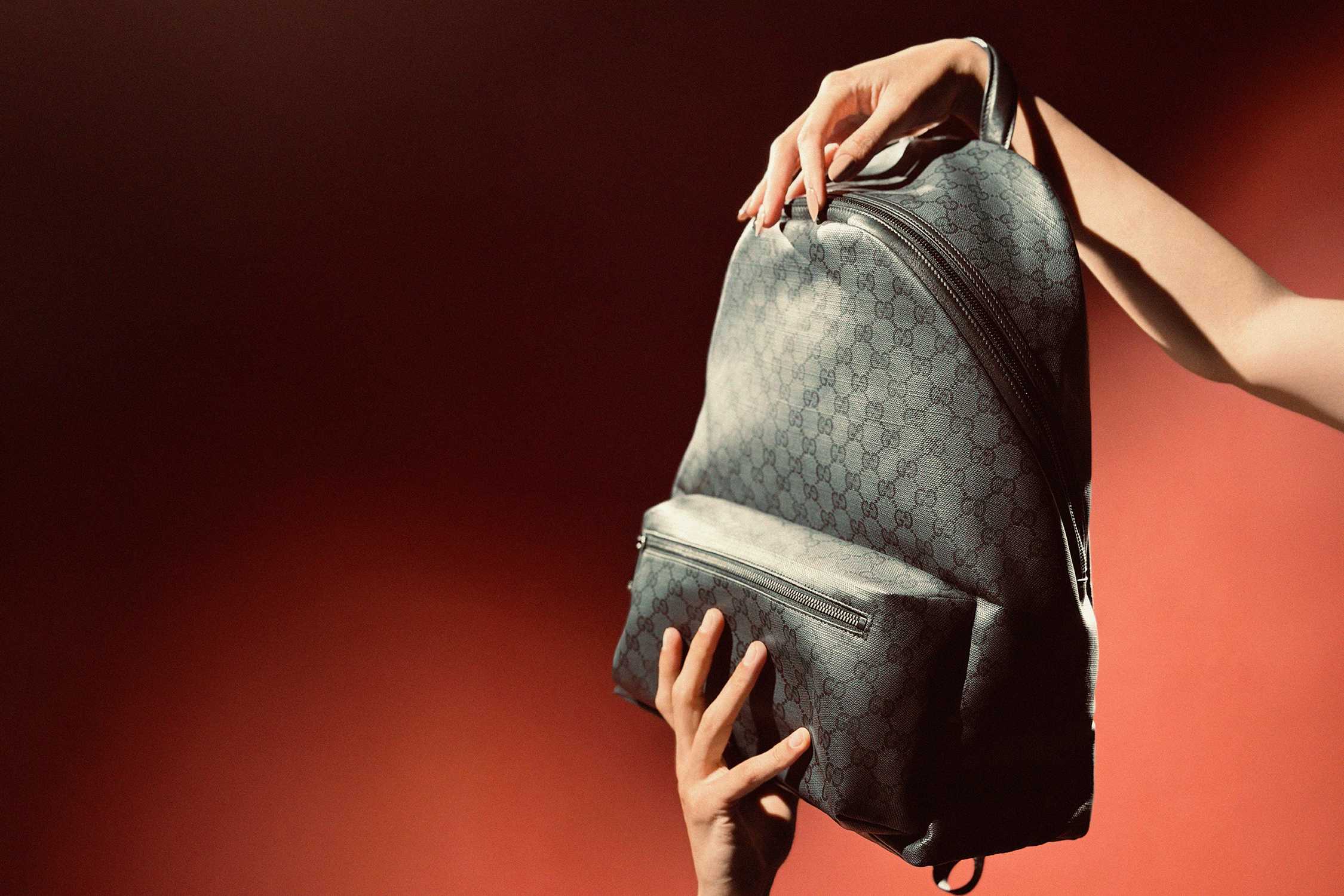 Grey Gucci monogram backpack
