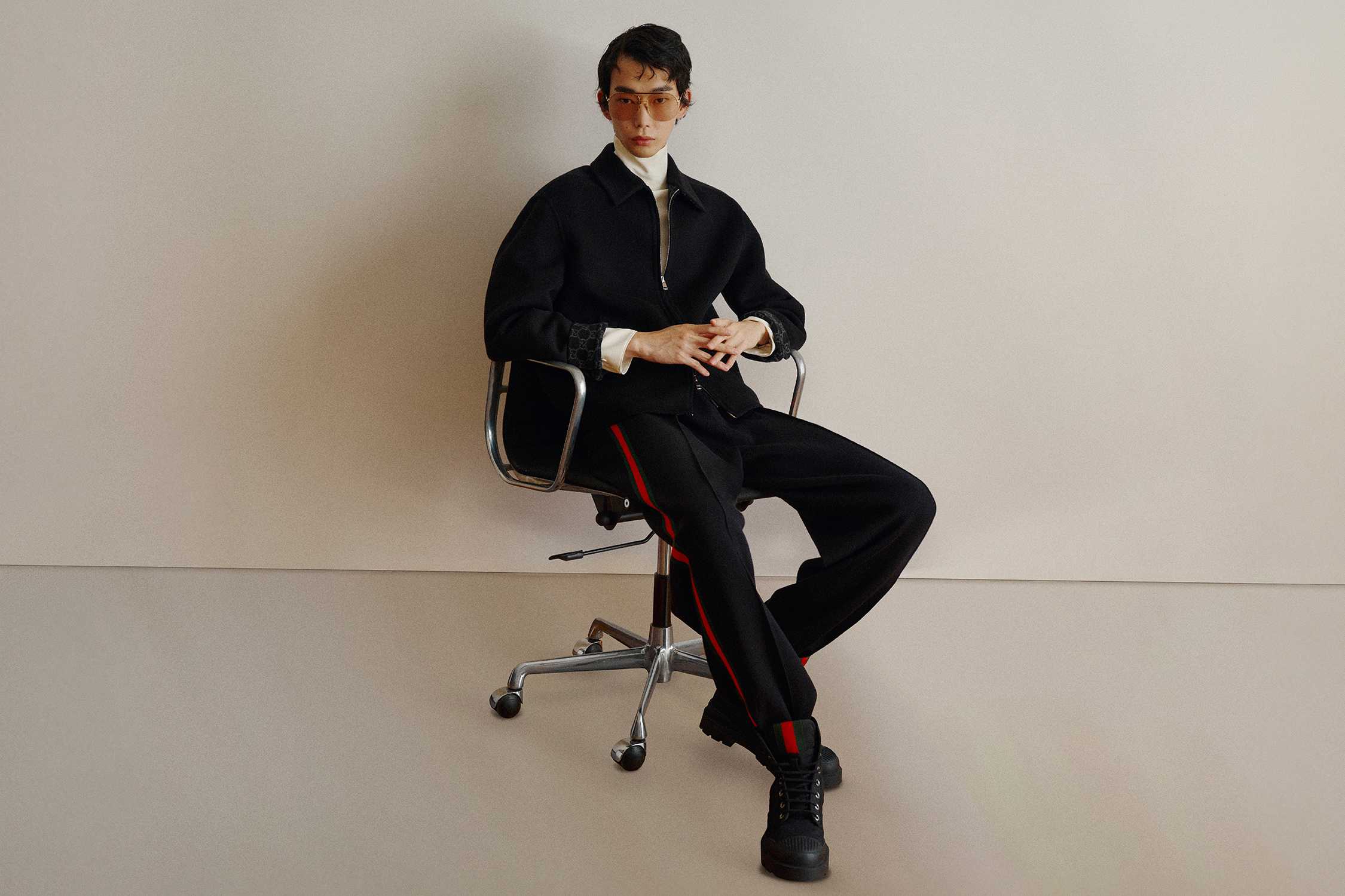 Gucci black suit with red-stripe