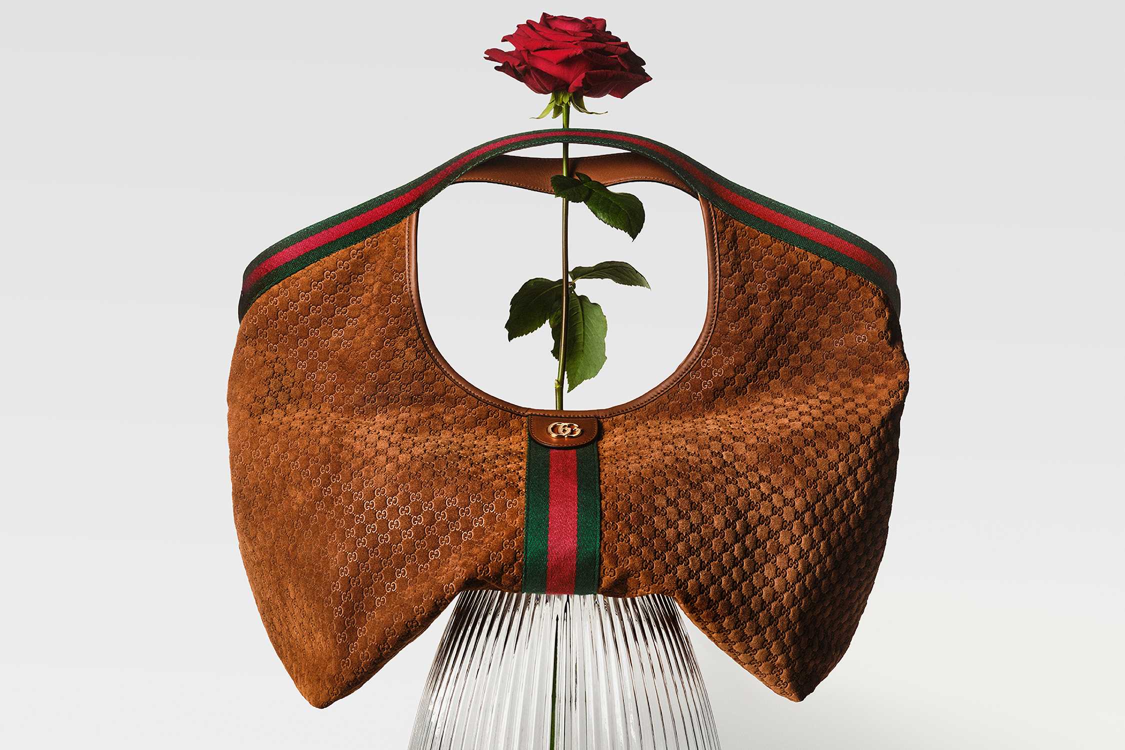 Brown Gucci bag with rose