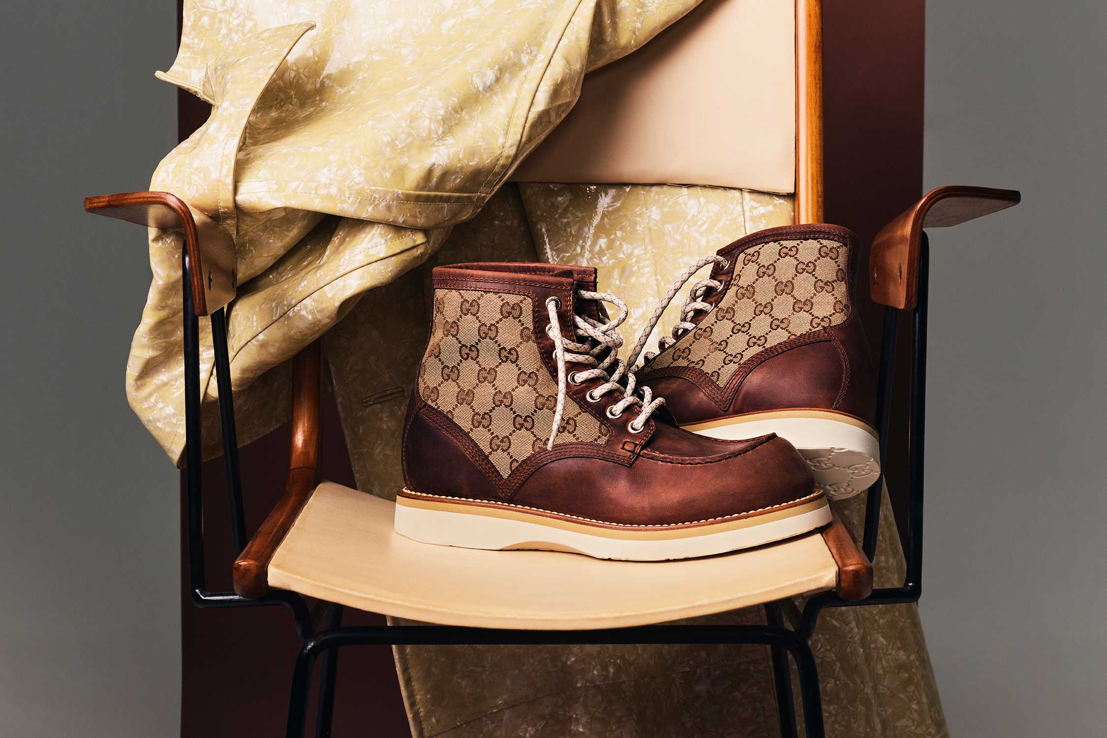 Brown Gucci monogram ankle boots